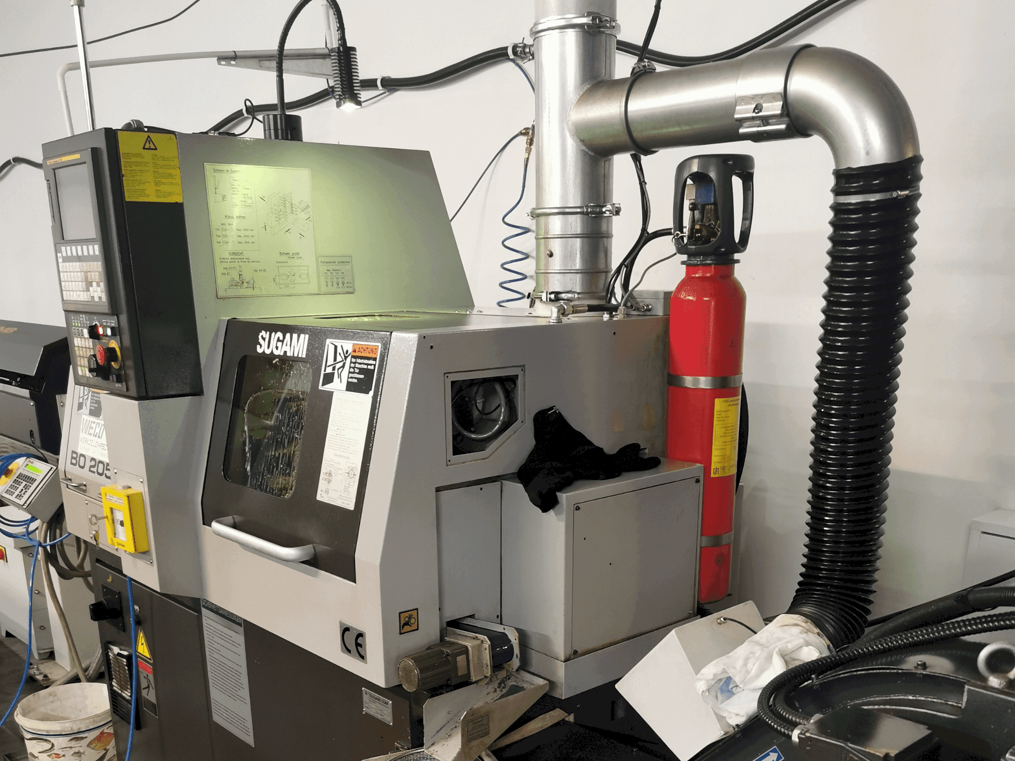 Вид станка TSUGAMI BO205E  спереди