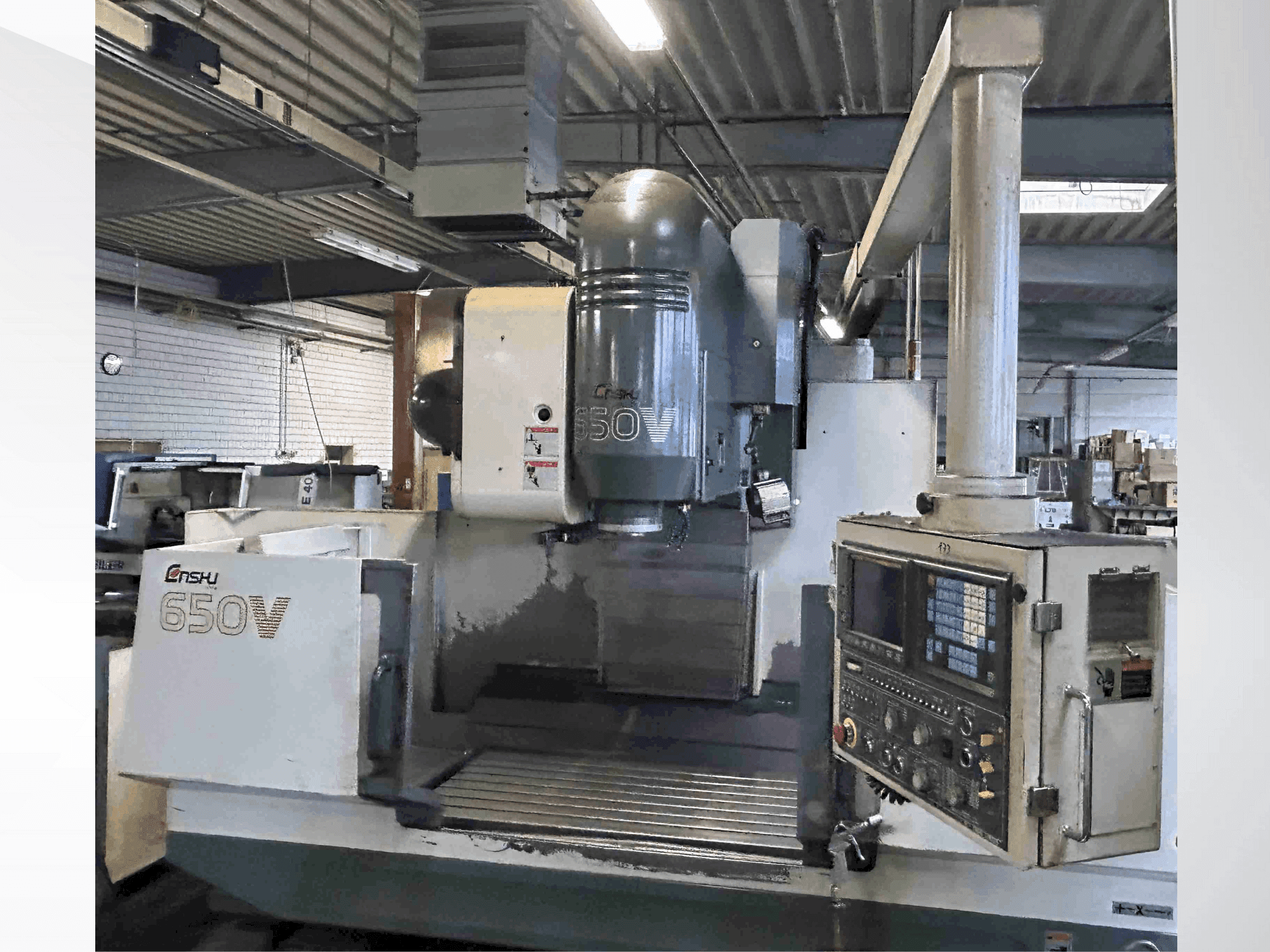 Вид станка Enshu 650 V  спереди