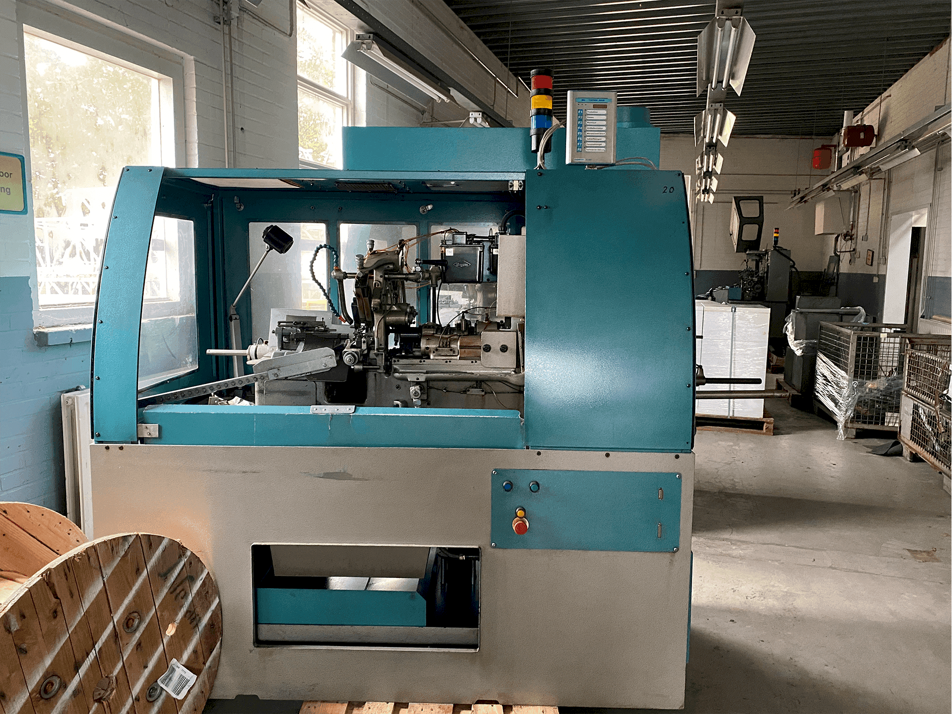 Вид станка Tornos-Bechler NAT-125 vario  спереди