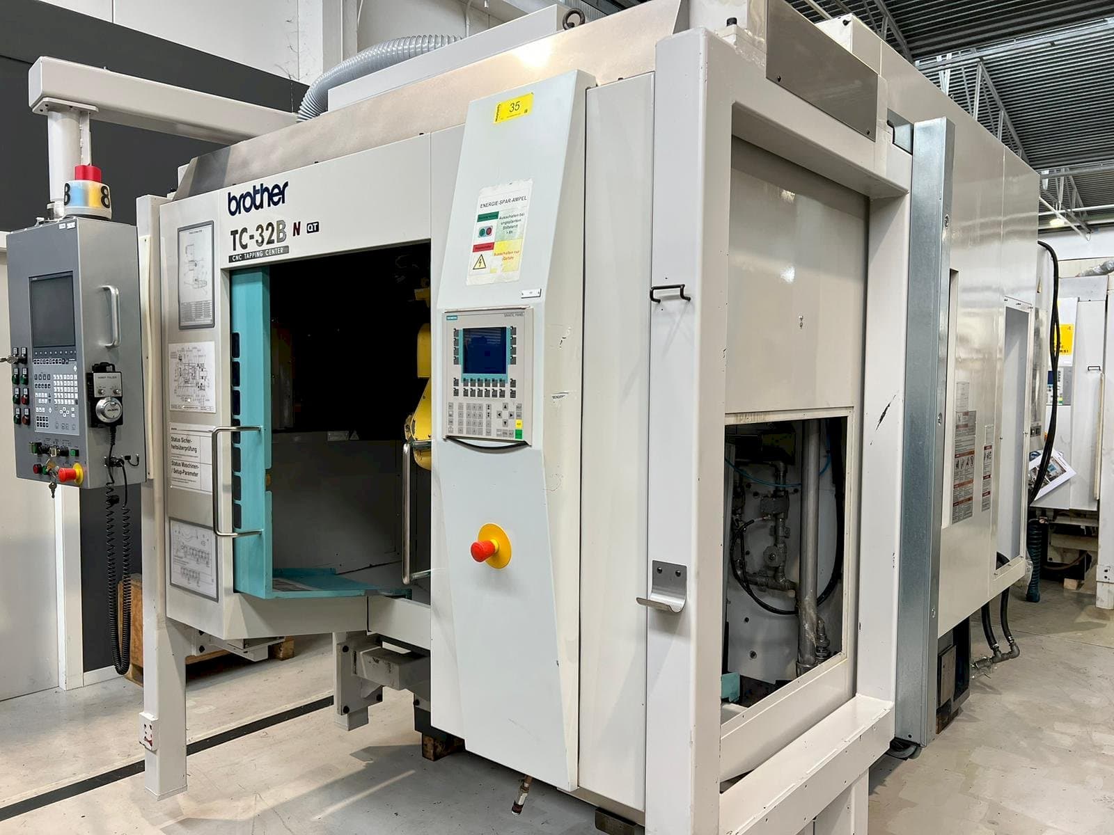 Вид станка Brother TC-32BN QT  спереди