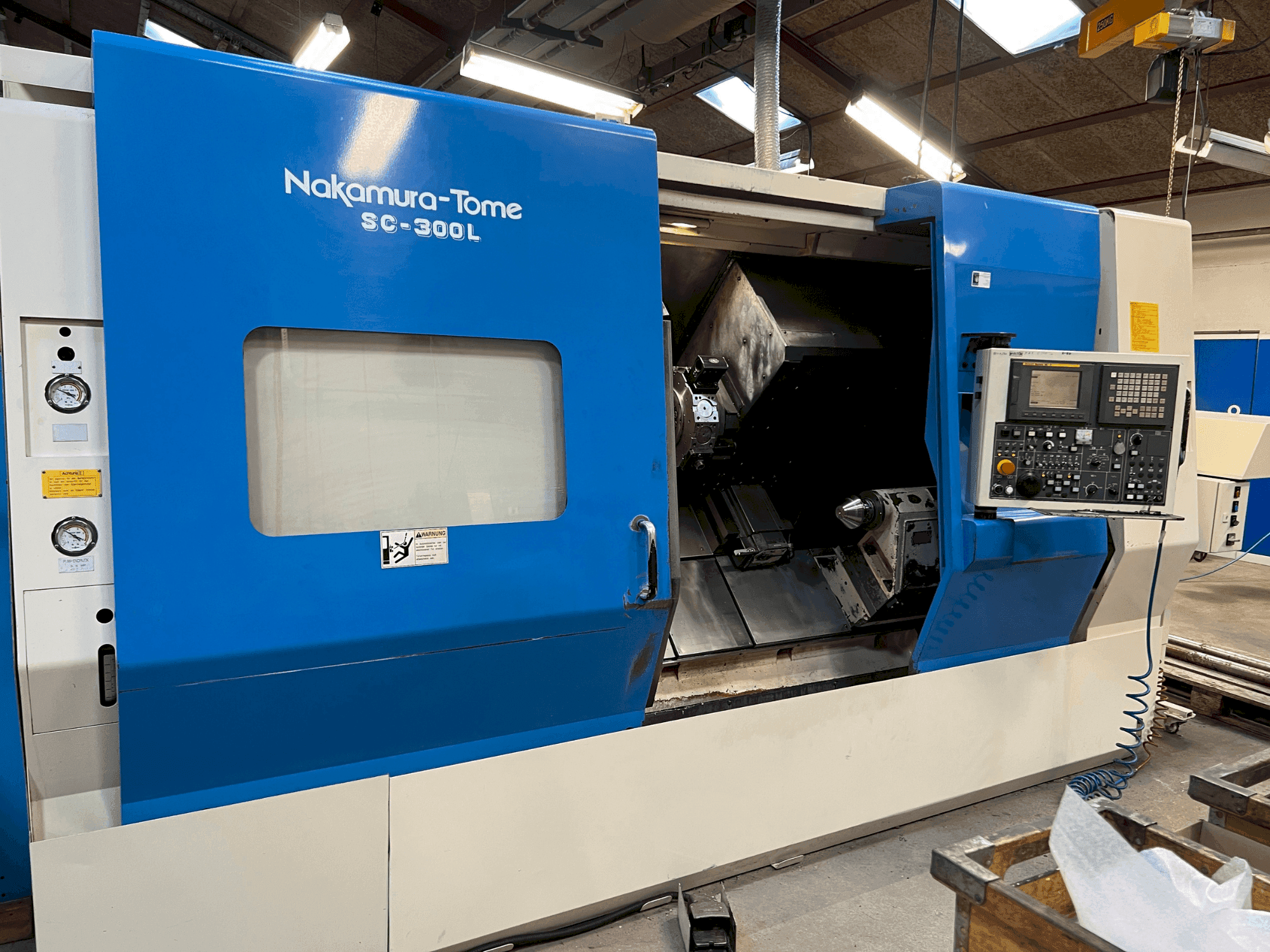 Вид станка NAKAMURA SL 300LY  спереди