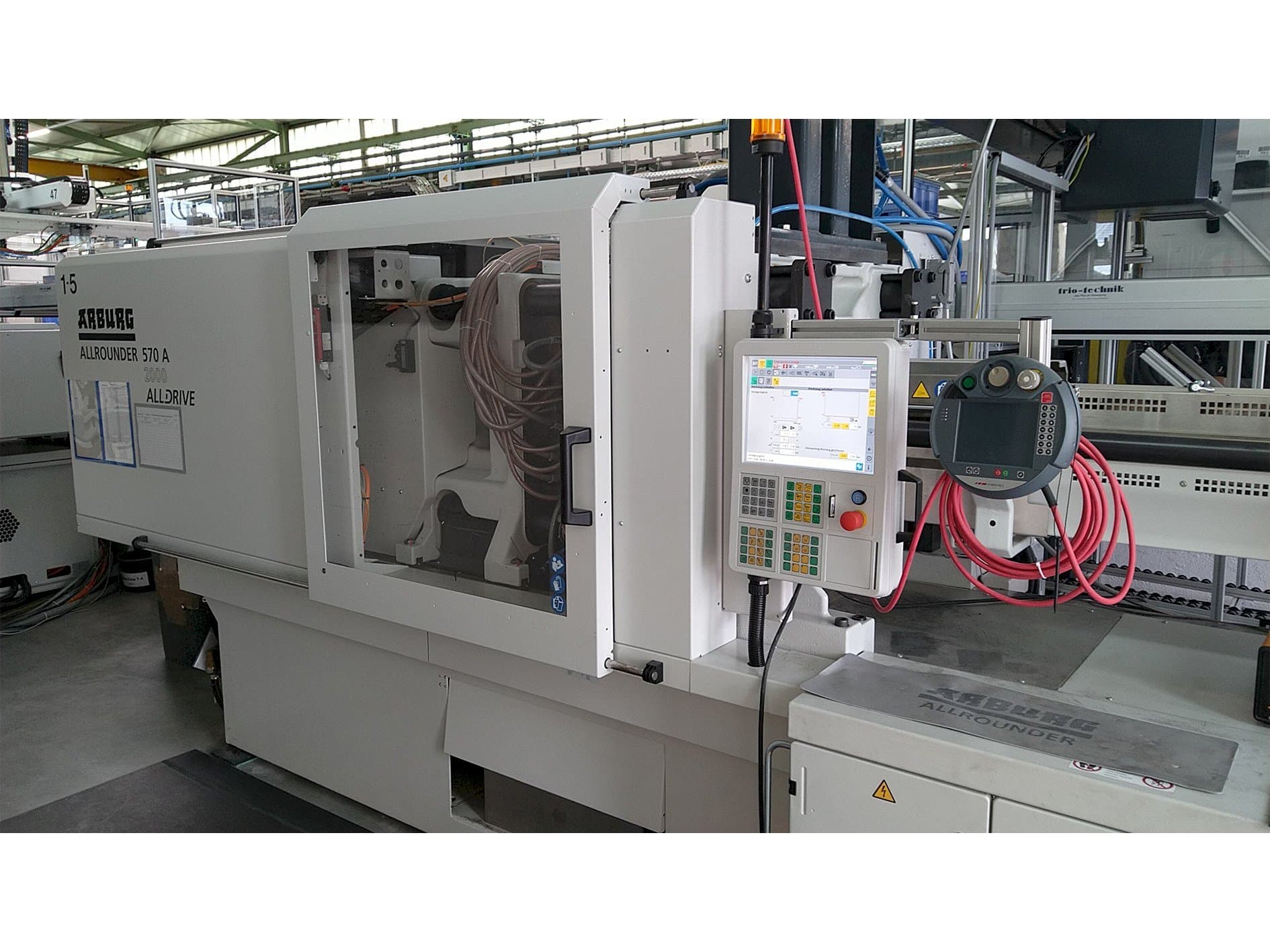 Вид станка Arburg Allrounder 570 A 2000-800 ALLDRIVE  спереди