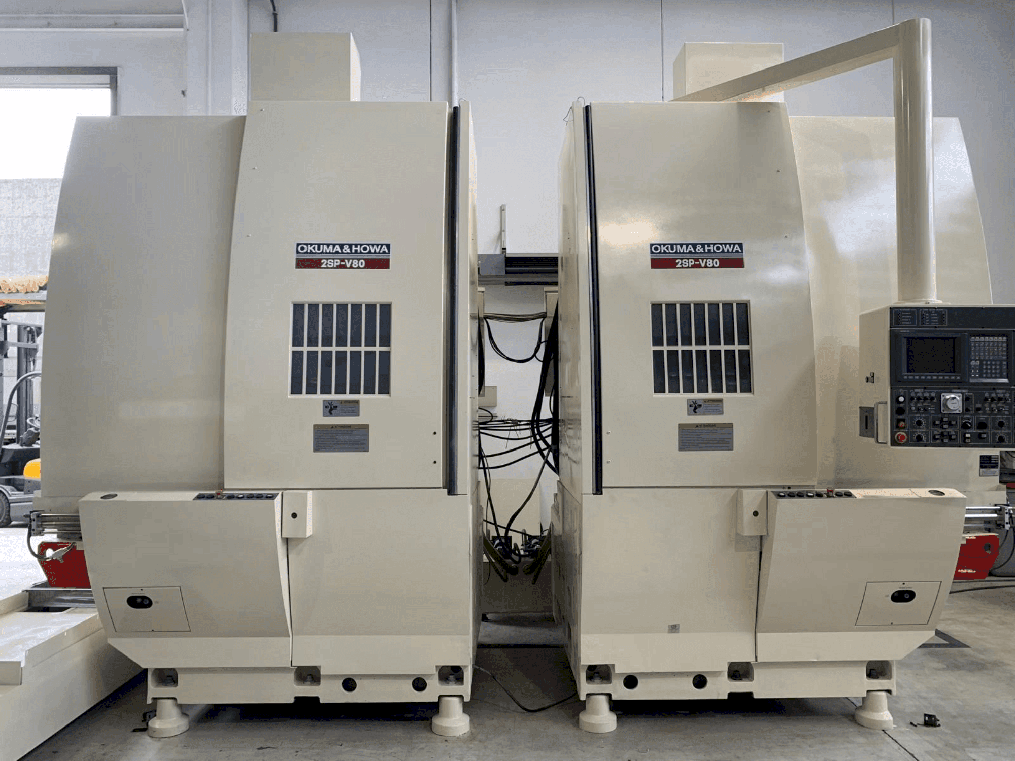 Вид станка Okuma 2SP-V80  спереди