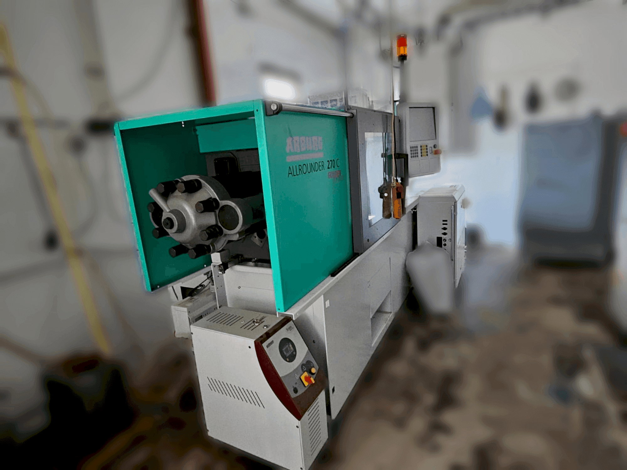 Вид  станка Arburg 270 C 400-70 Golden Edition  сбоку