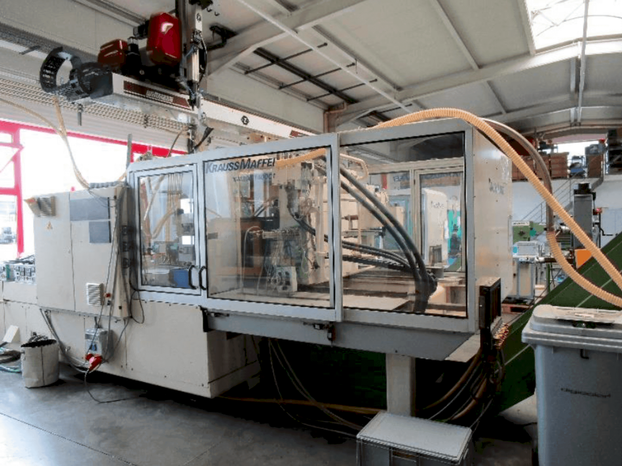 Вид станка Krauss Maffei 300-1400 C1  спереди
