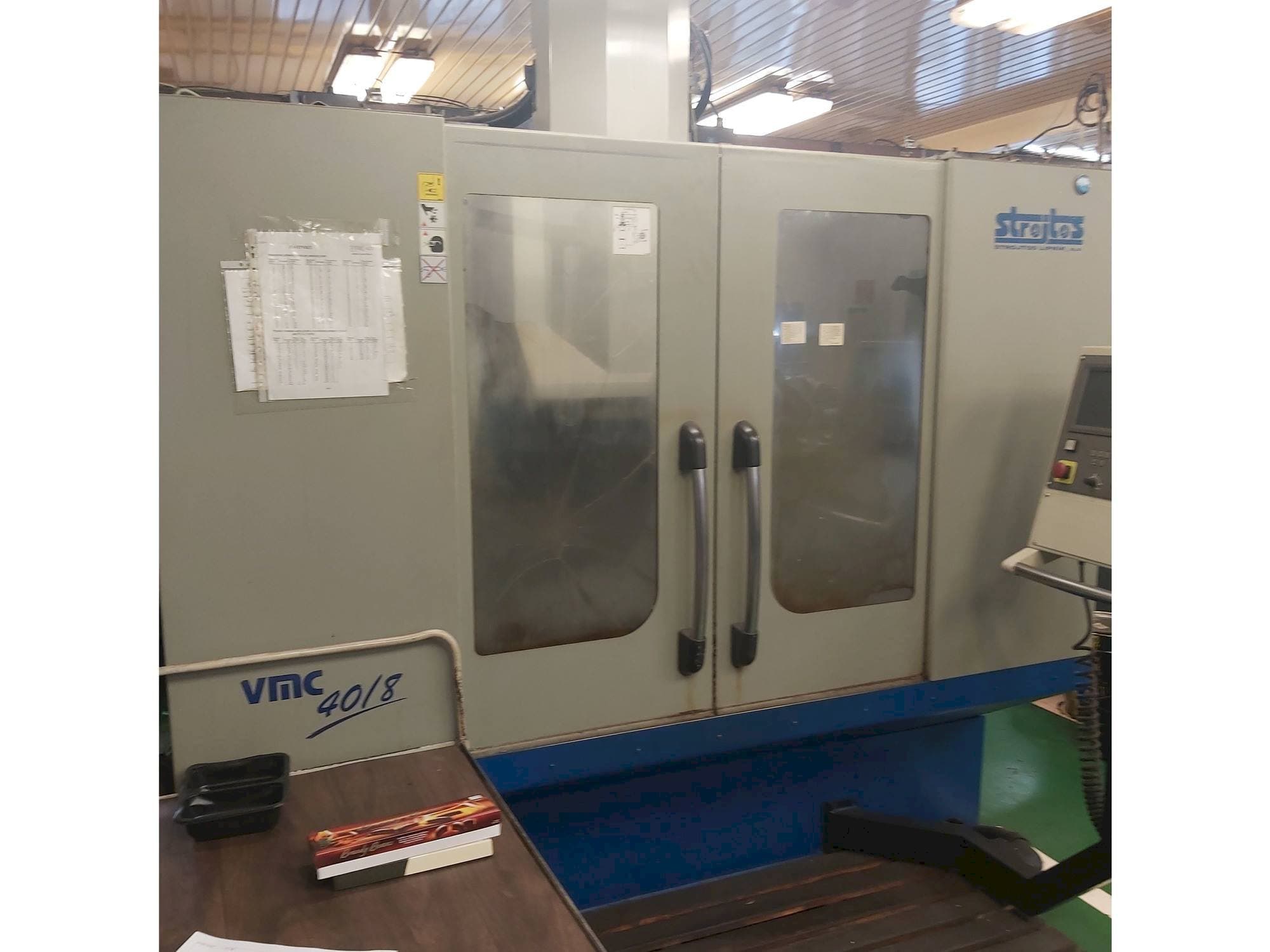 Вид станка Strojtos  VMC 40/8  спереди