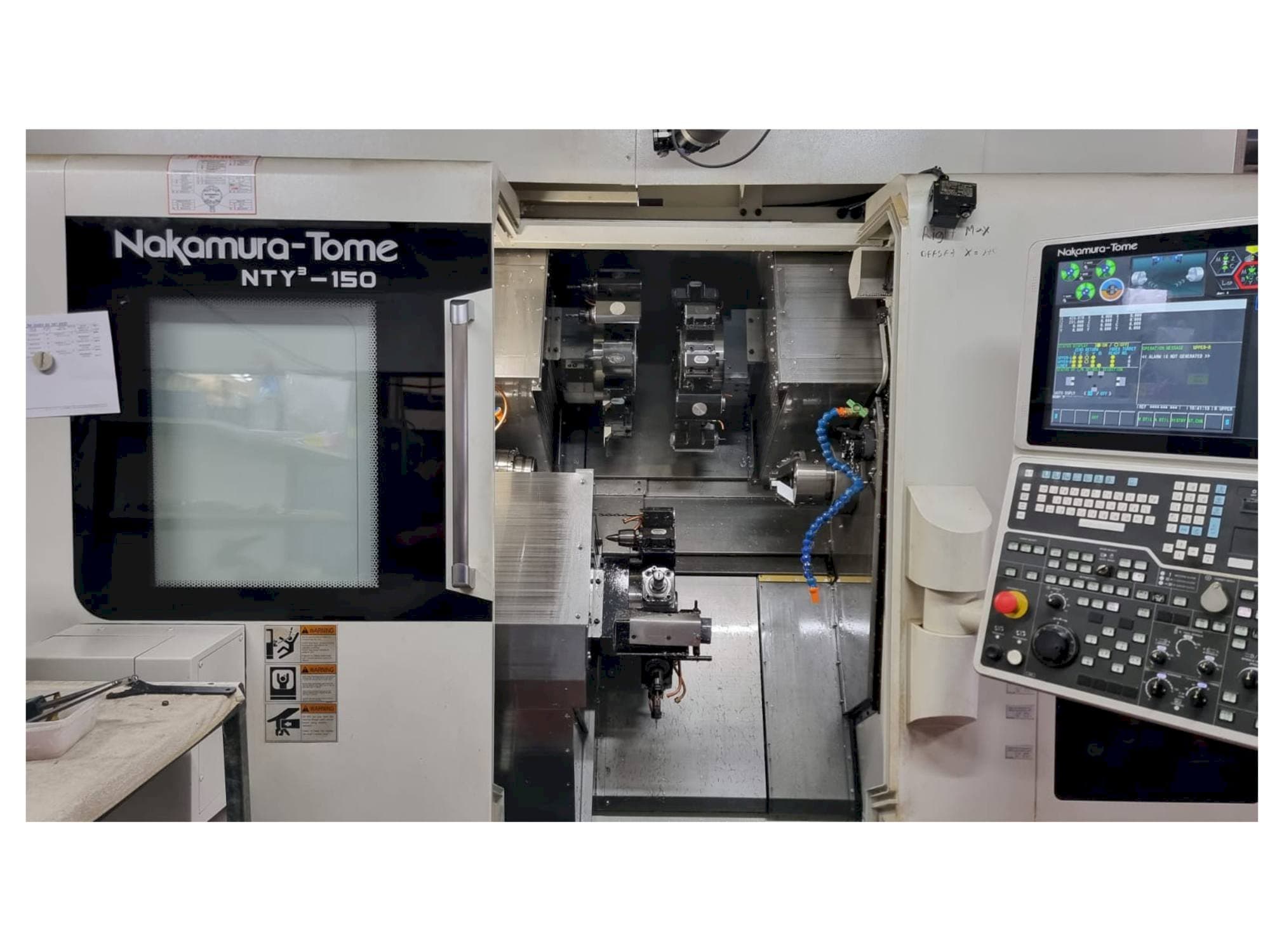 Вид станка NAKAMURA-TOME NTY3-150  спереди