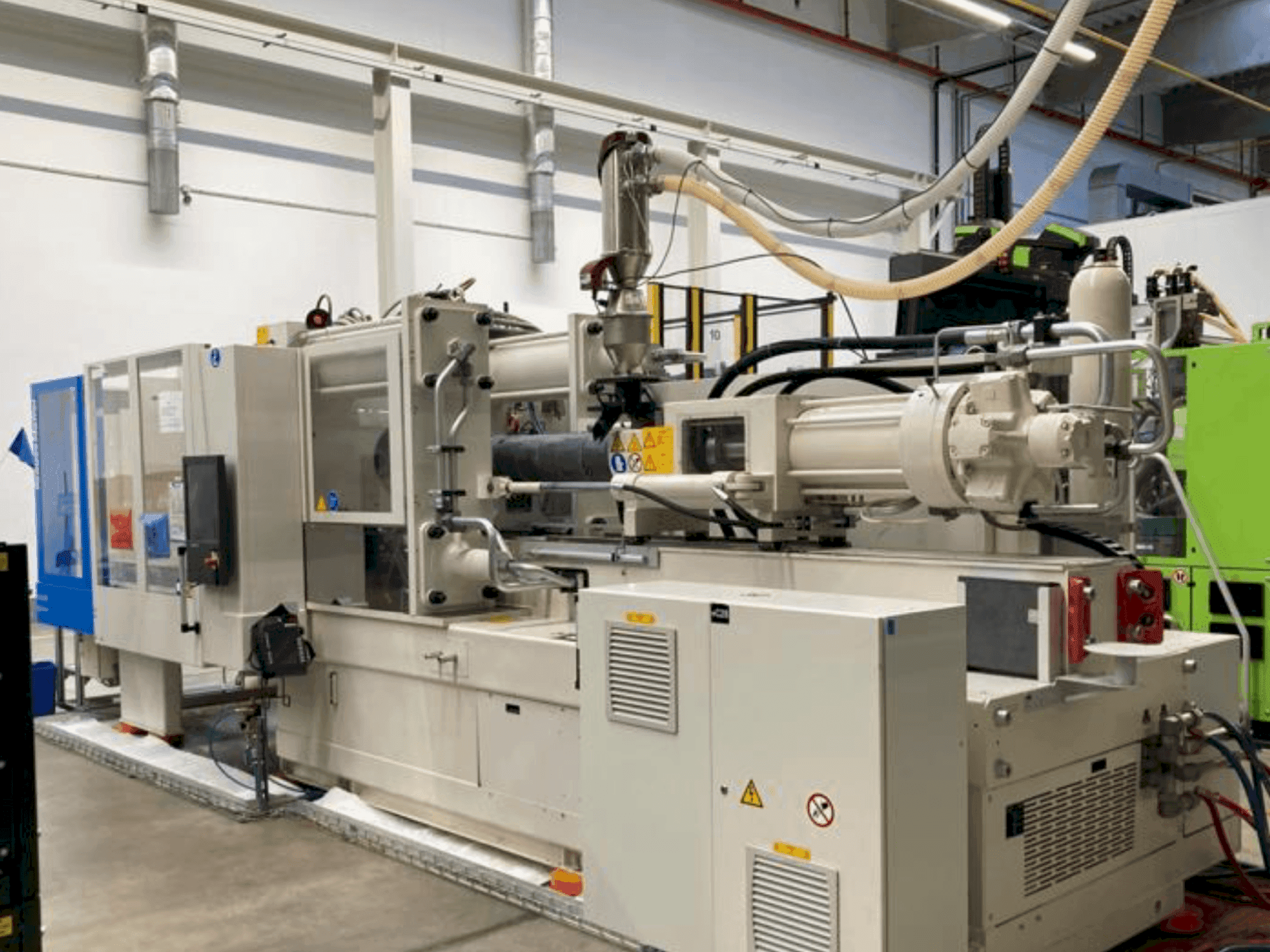 Вид станка Krauss Maffei 420-2000 CX  спереди