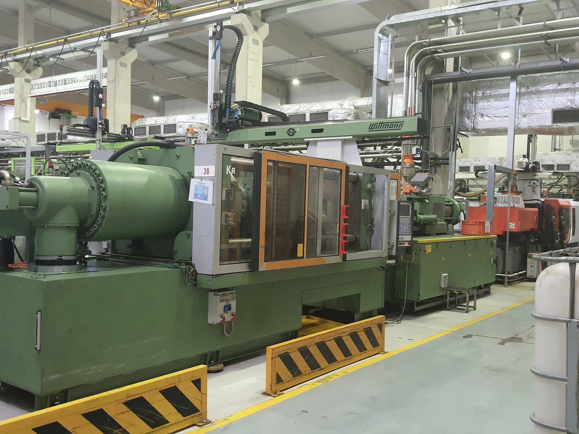 Вид станка Krauss Maffei 420-3000  спереди