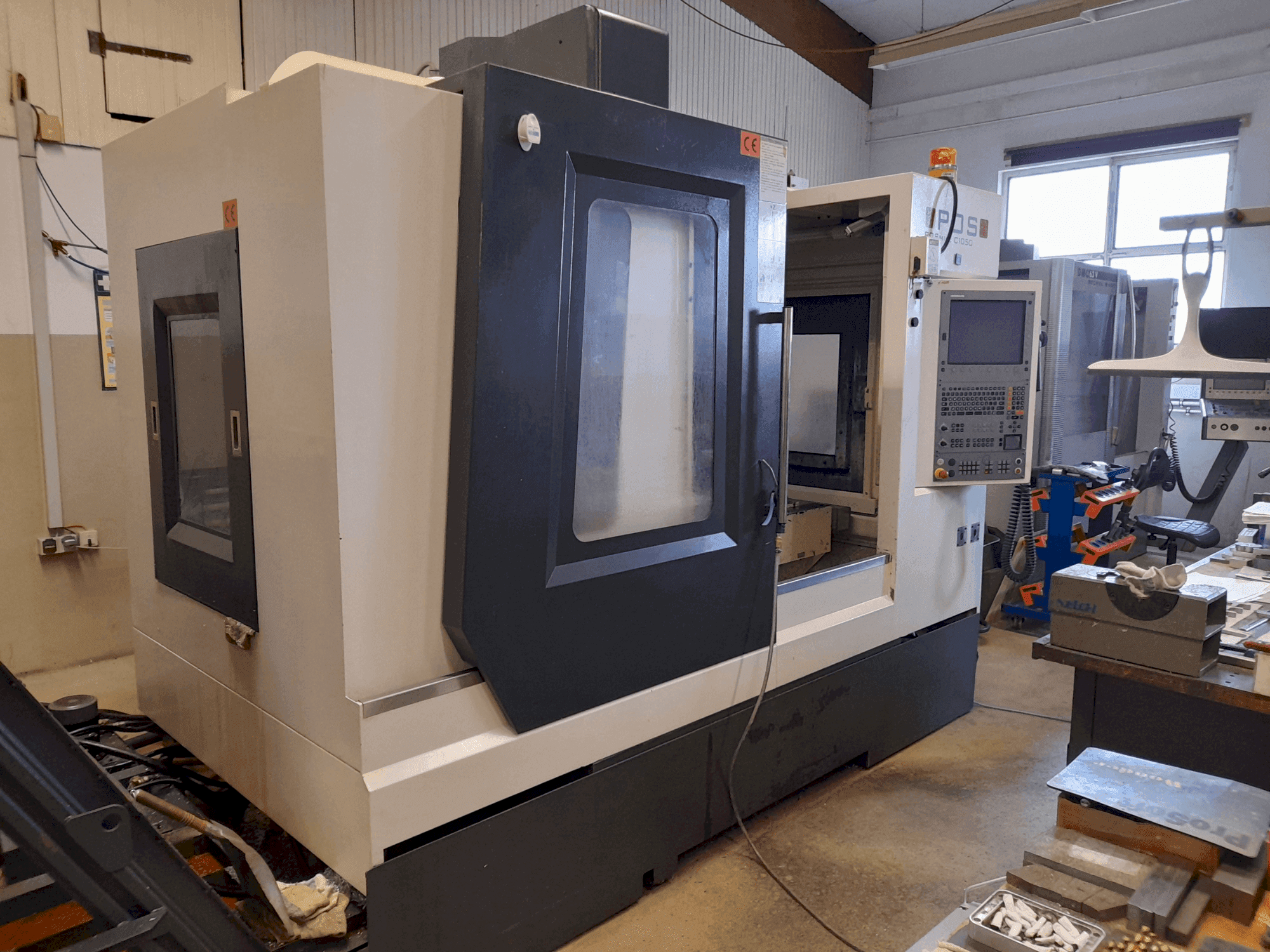 Вид станка POSmill C 1050  спереди