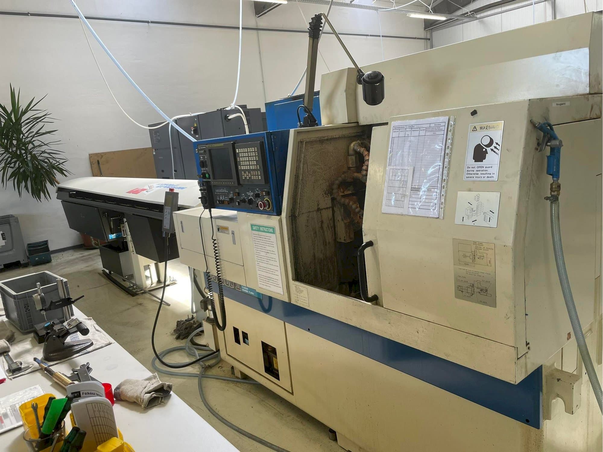 Вид  станка с TSUGAMI BS20-II  правой строны