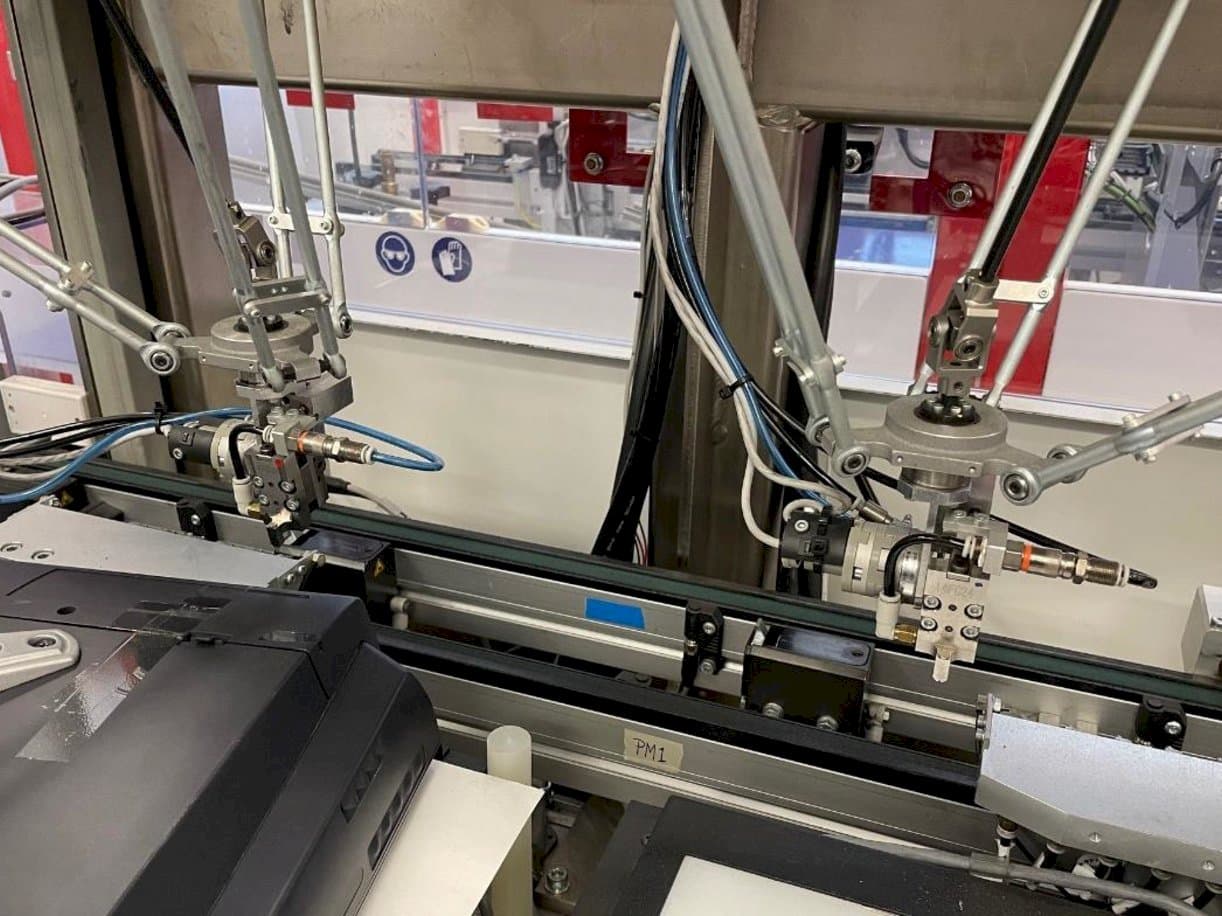 Вид станка IMS Tattoo Assembly Line  спереди