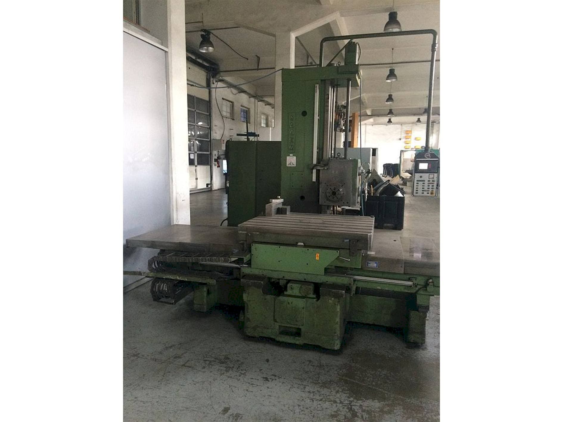 Вид станка Sacem									 MST-XC/110 A/C  спереди