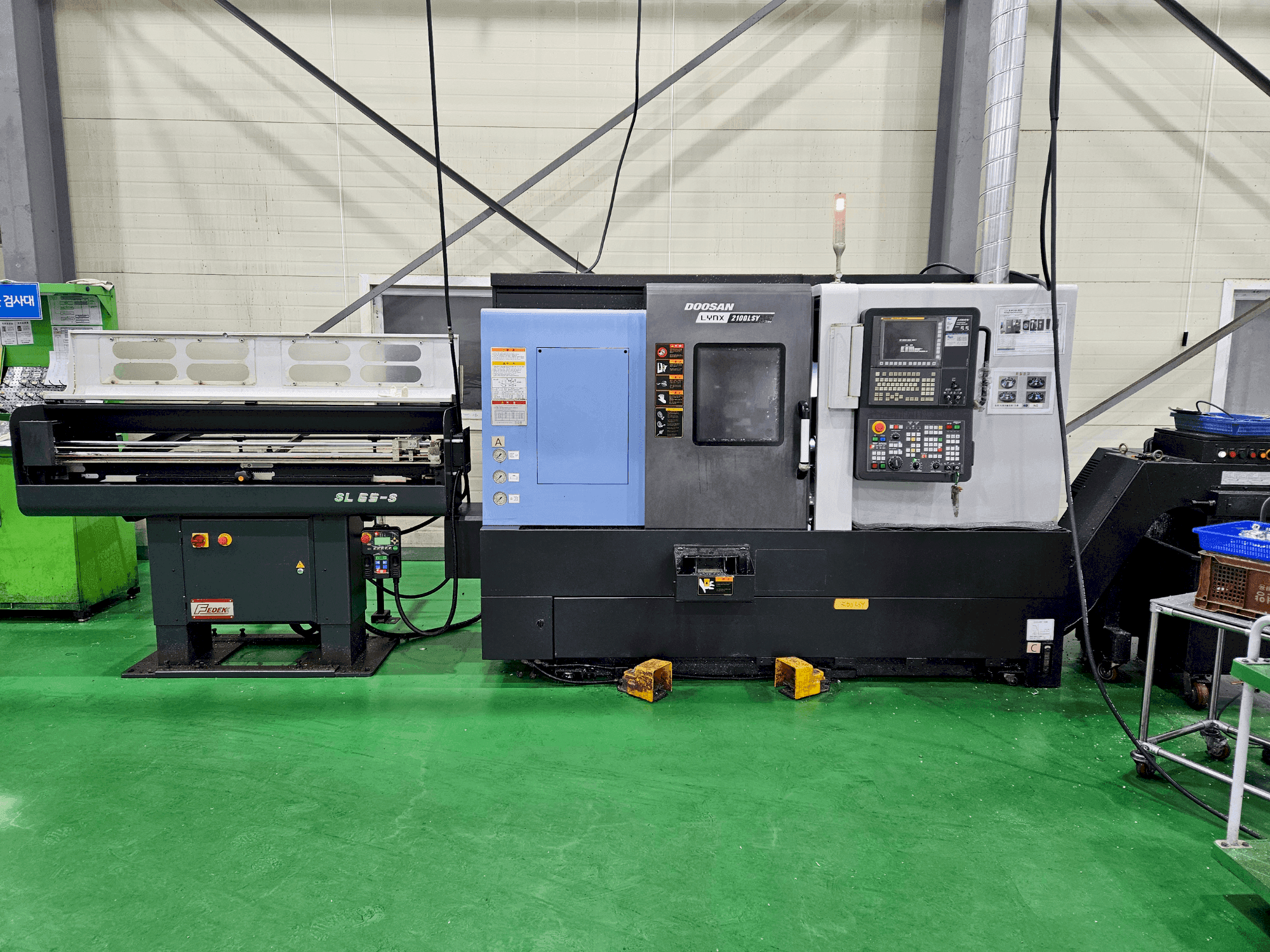 Вид станка DOOSAN LYNX 2100 LSYB  спереди