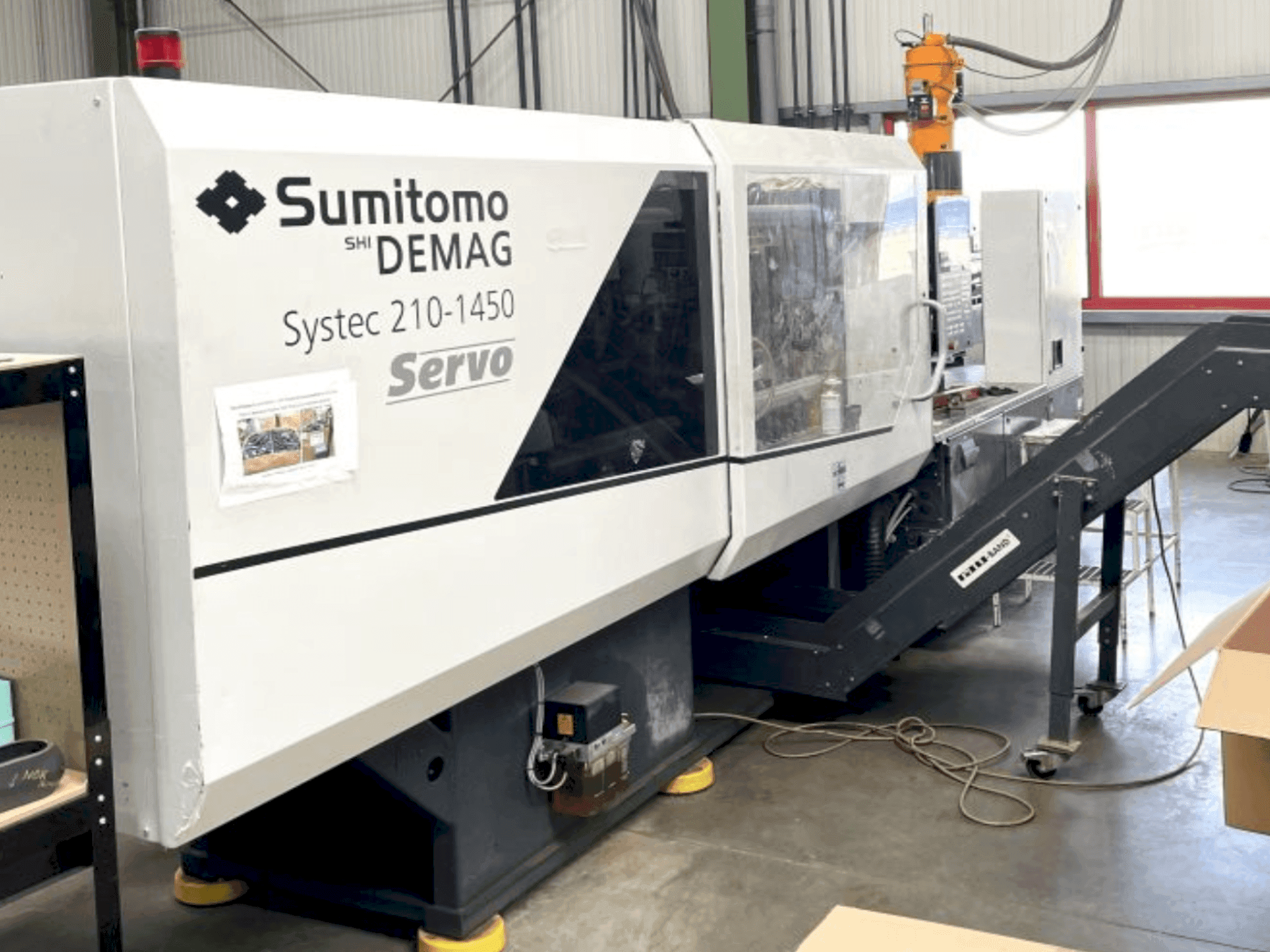 Вид станка DEMAG System 210-1450  спереди
