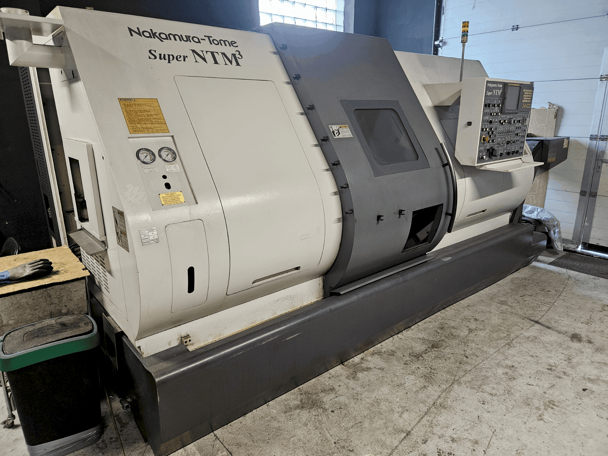Вид станка NAKAMURA-TOME Super NTM3  спереди