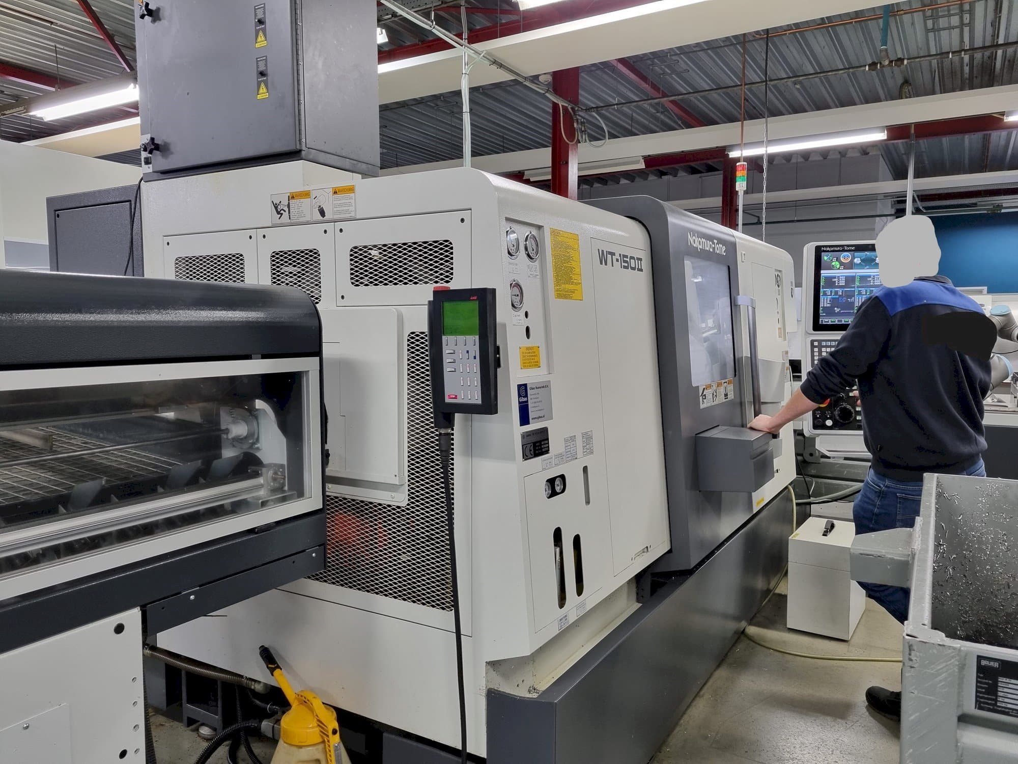 Вид станка NAKAMURA-TOME WT-150II  спереди