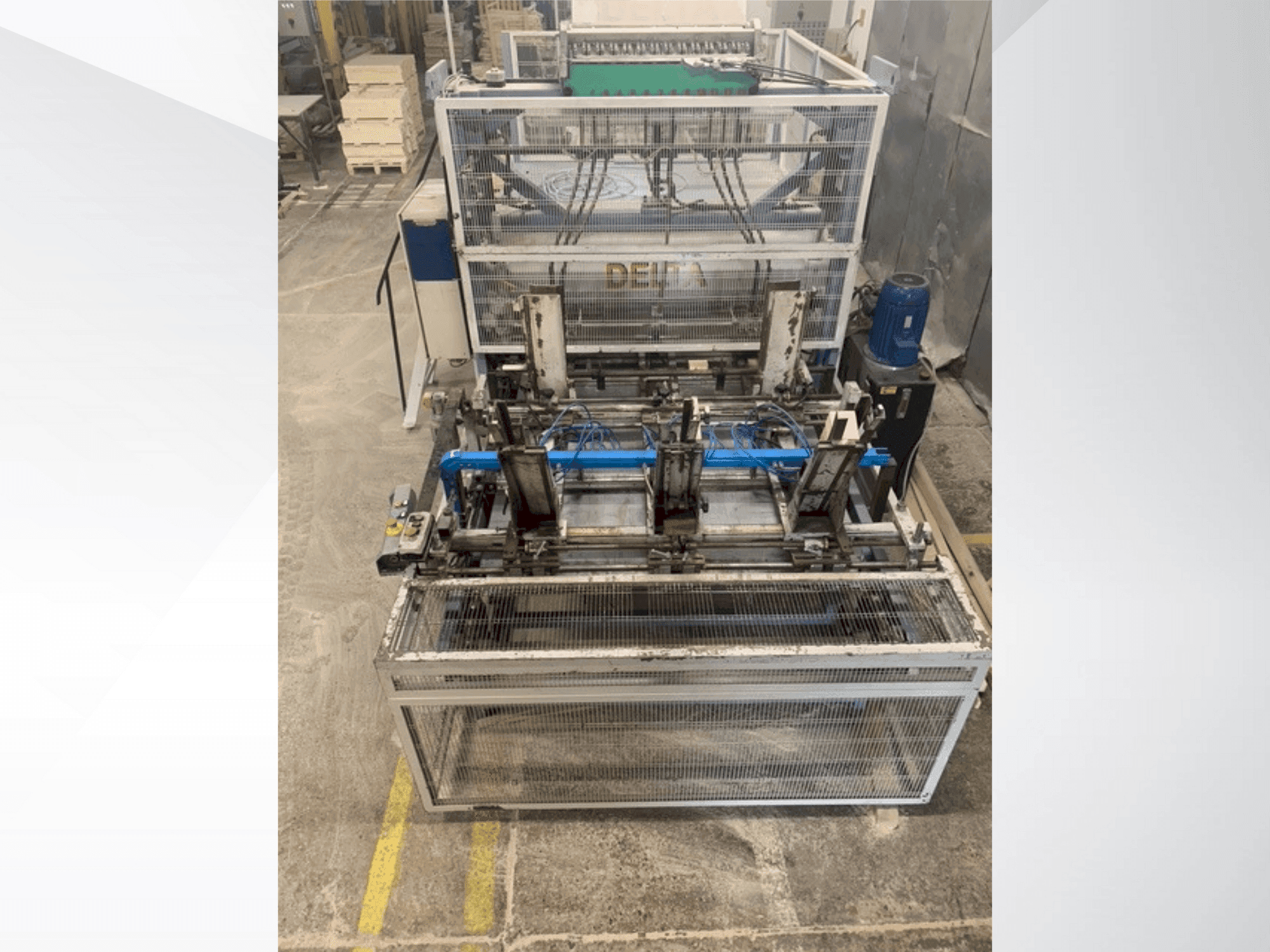 Вид станка DELTA pallet nailing machine line  спереди