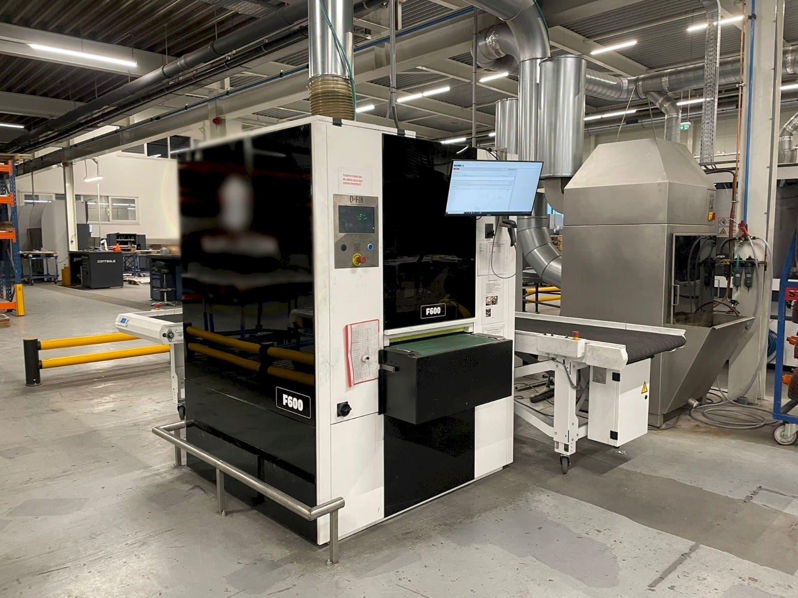 Вид станка Q-FIN F600  спереди