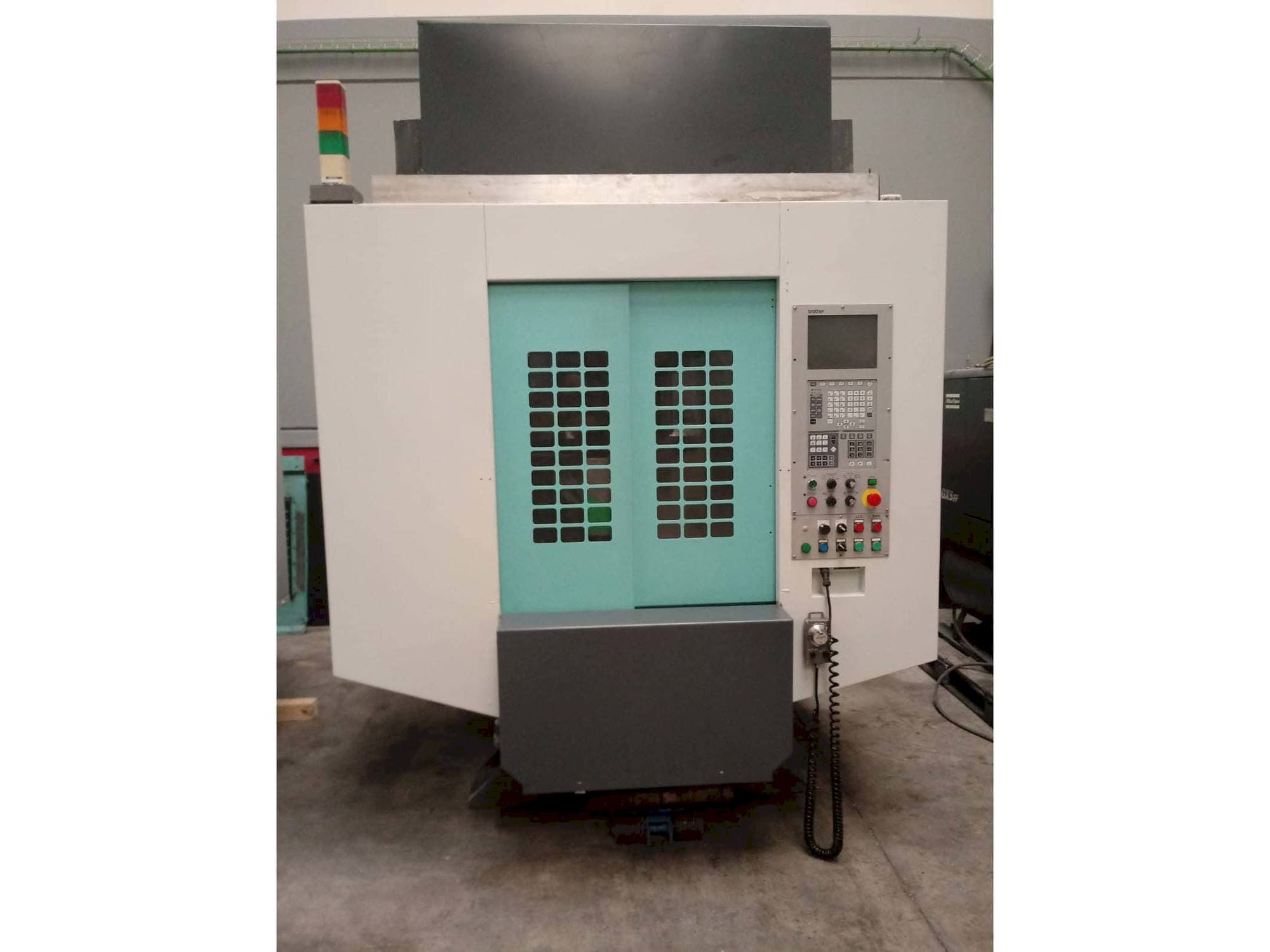 Вид станка Brother TC-S2DN-O  спереди