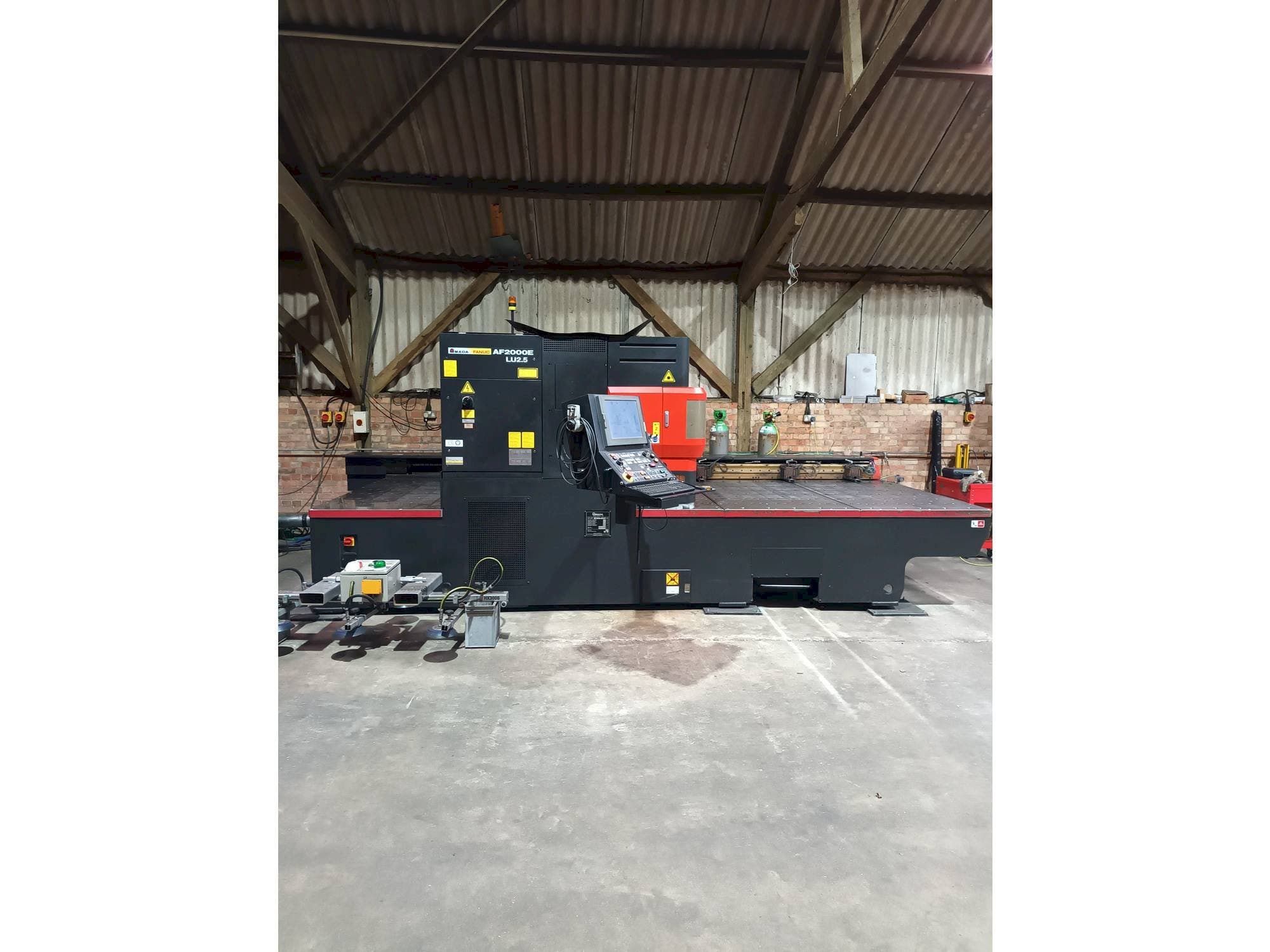 Вид станка AMADA LC 2415 alpha 4 NT  спереди