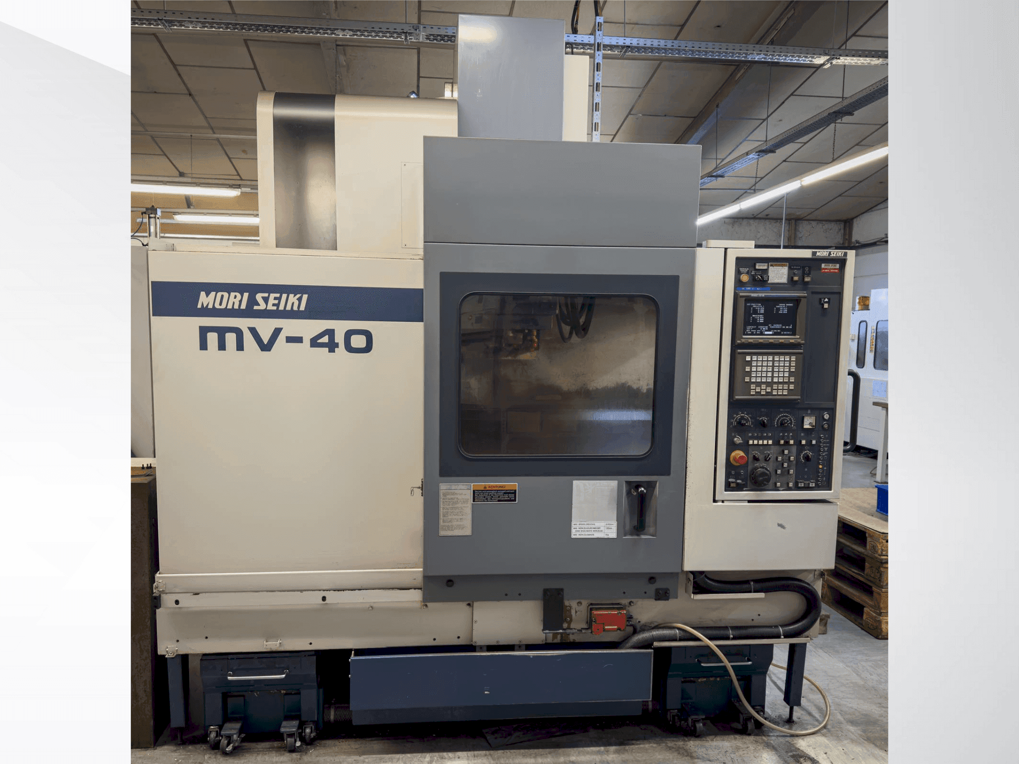 Вид станка MORI SEIKI MV 40B/40  спереди