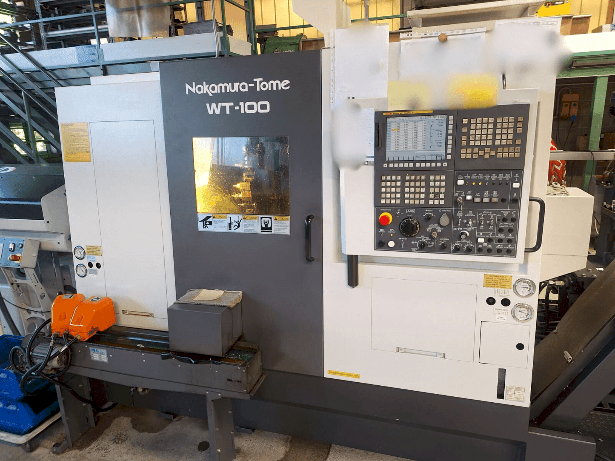 Вид станка NAKAMURA-TOME WT-100  спереди