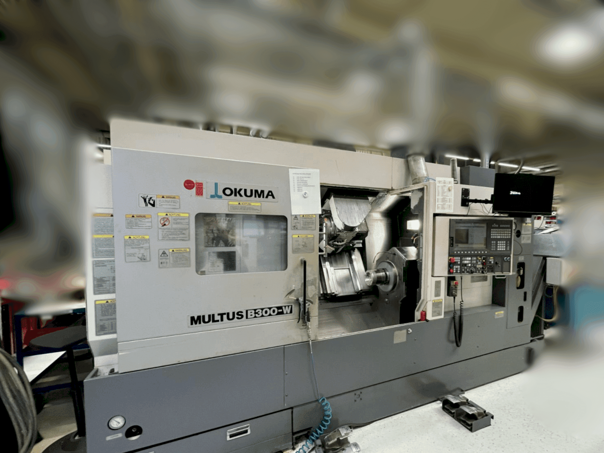 Вид станка Okuma Multus B300-W  спереди