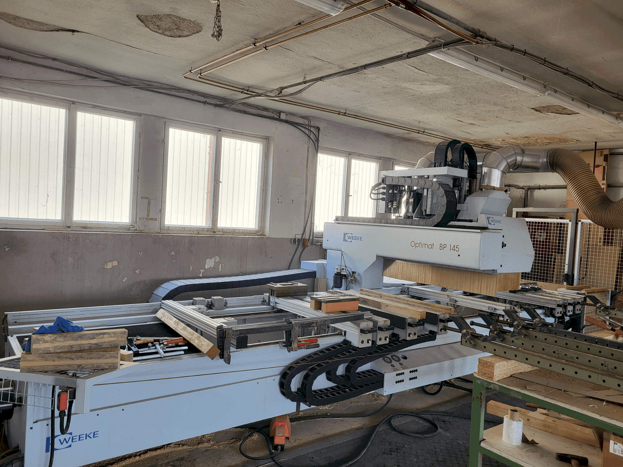 Вид станка Weeke Optimat BP145  спереди
