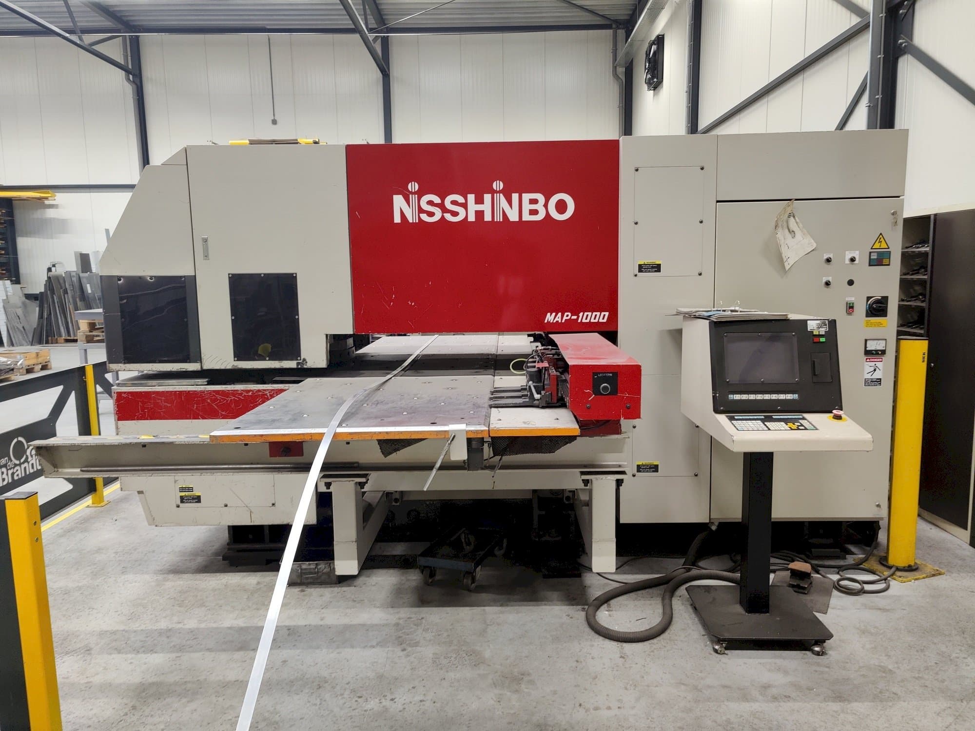 Вид станка Nisshinbo MAP-1000  спереди