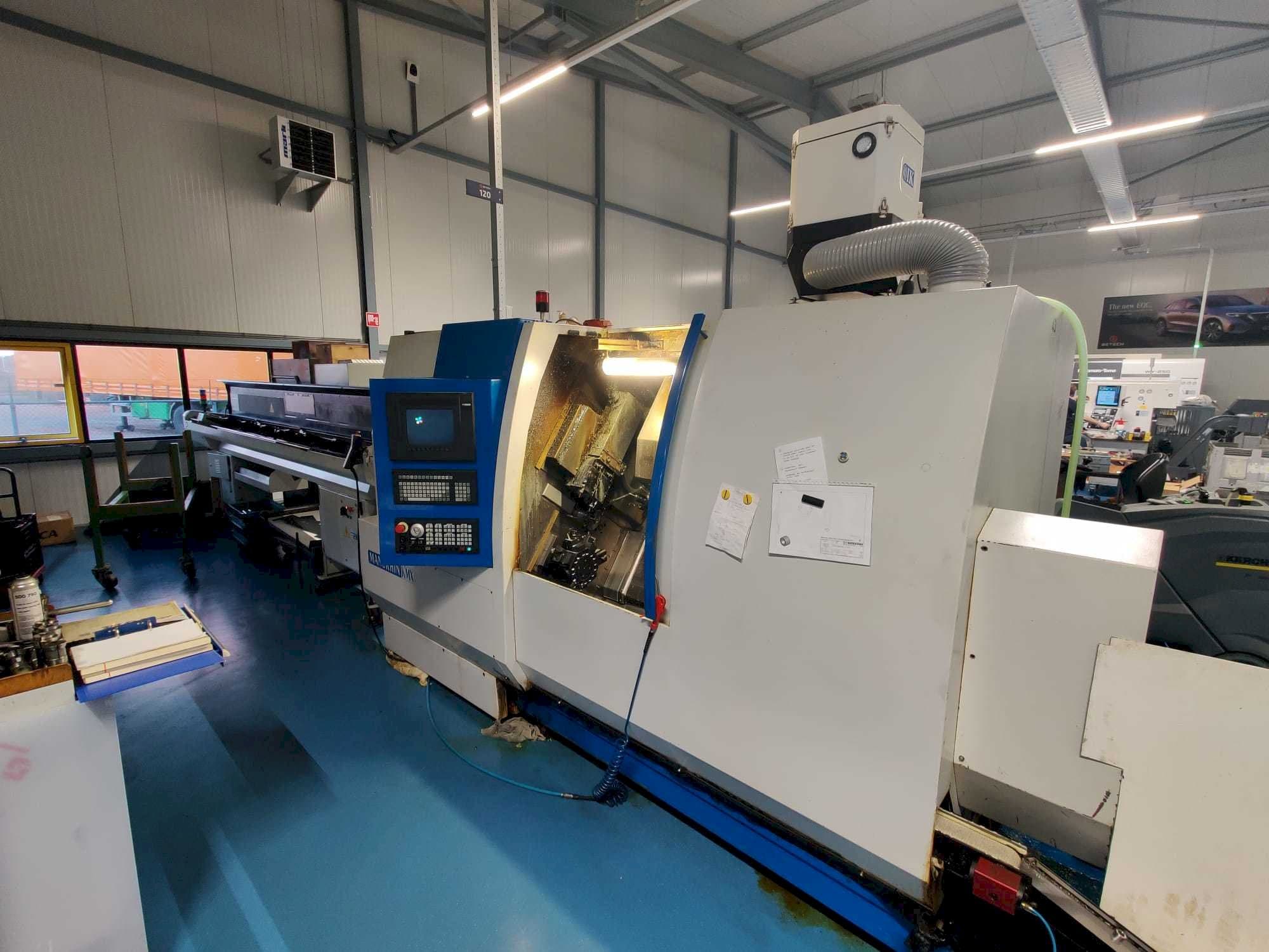 Вид станка Manurhin K'MX XL 32  спереди