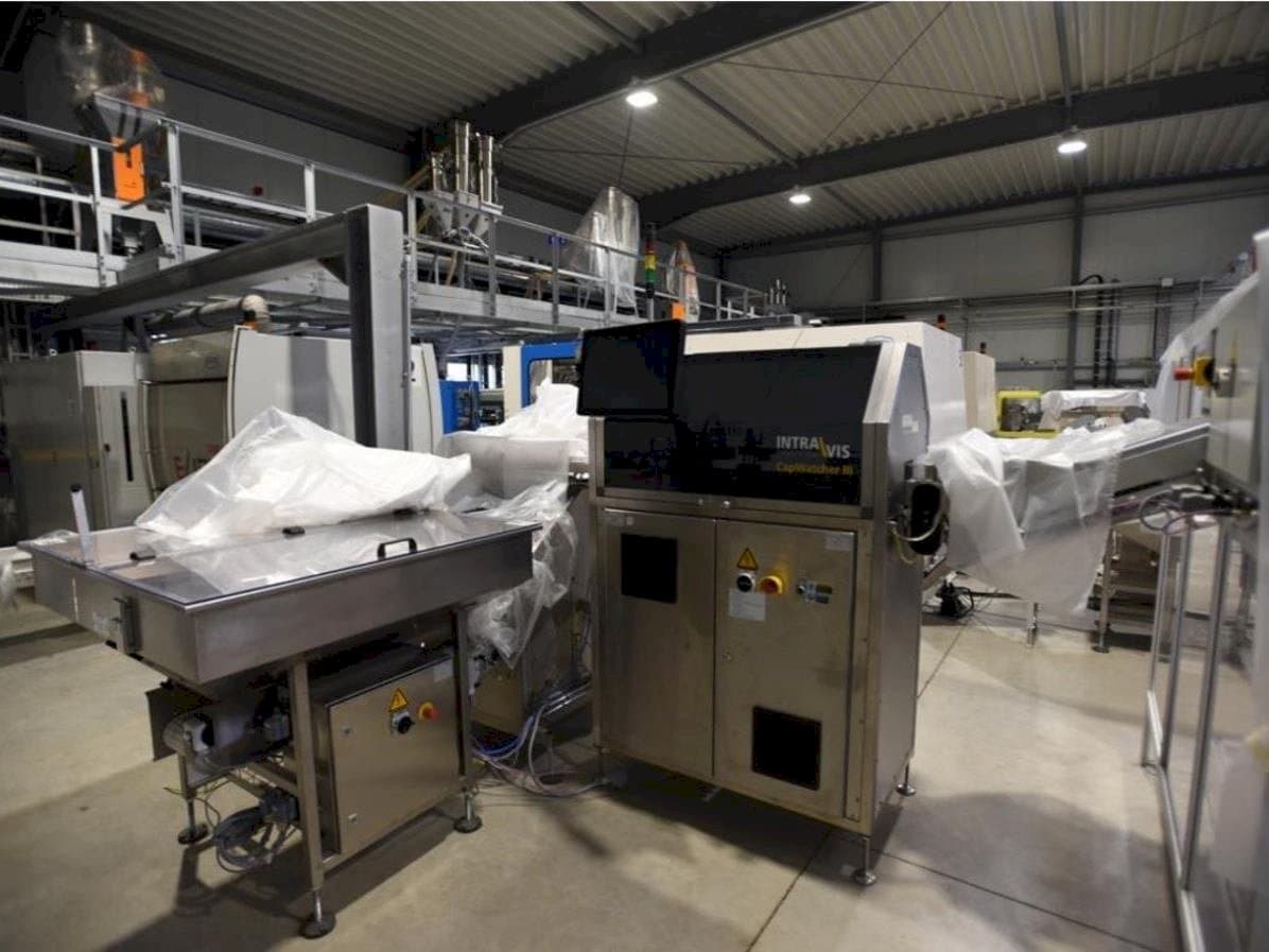 Вид станка INTRAVIS Capwatcher 6275  спереди