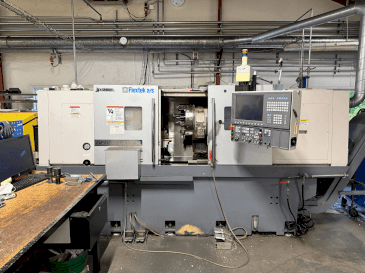Вид станка Okuma Genos L300E-M with FMB Turbo 8-80  спереди