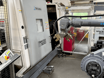 Вид станка Okuma Twinstar LT300-M  спереди