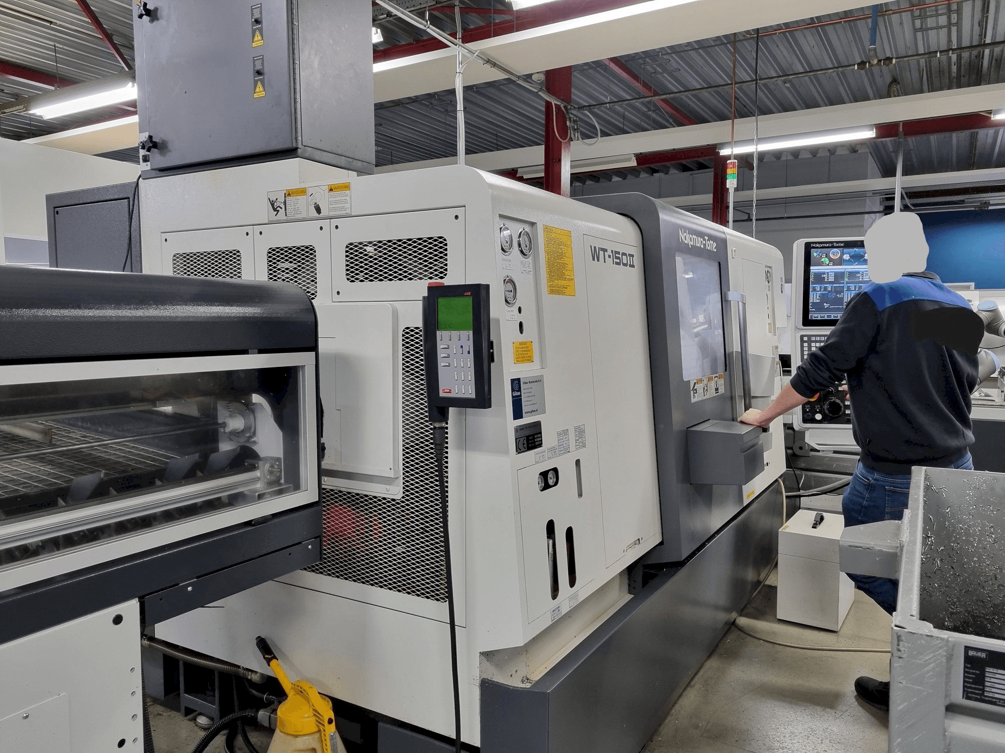 Вид станка NAKAMURA-TOME WT-150II спереди