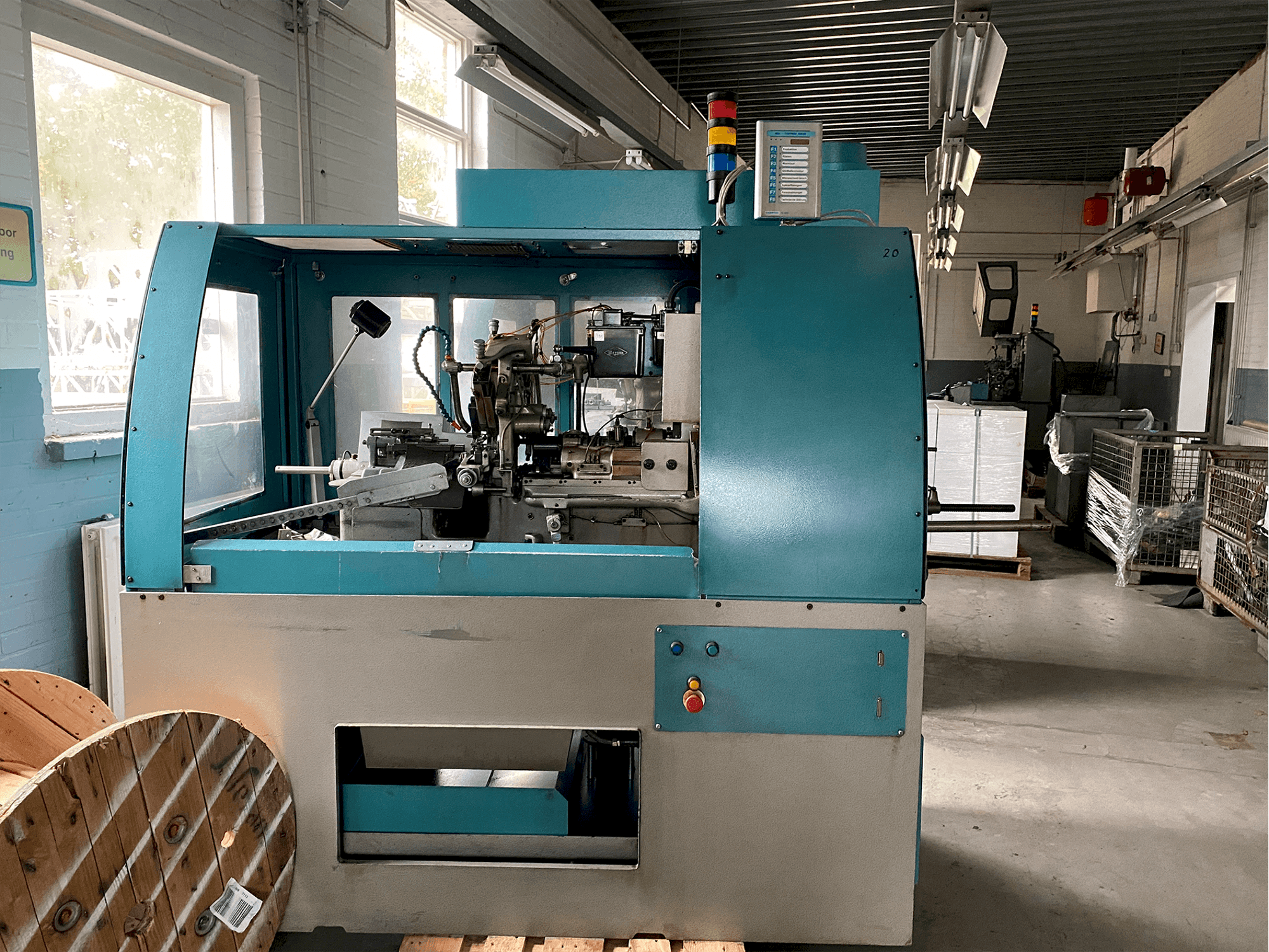 Вид станка Tornos-Bechler NAT-125 vario спереди