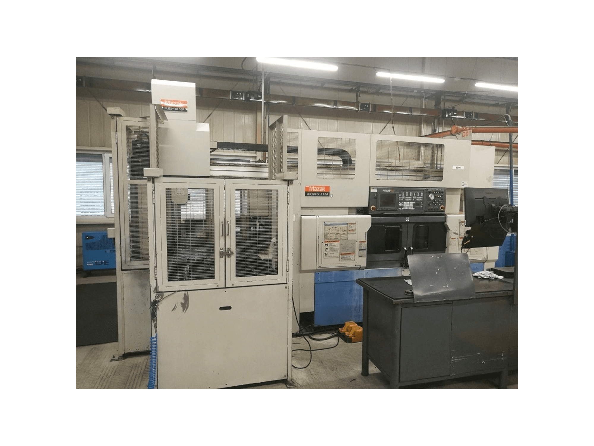 Вид станка Mazak Multiplex 6100 + robot FLEX-GL50F спереди