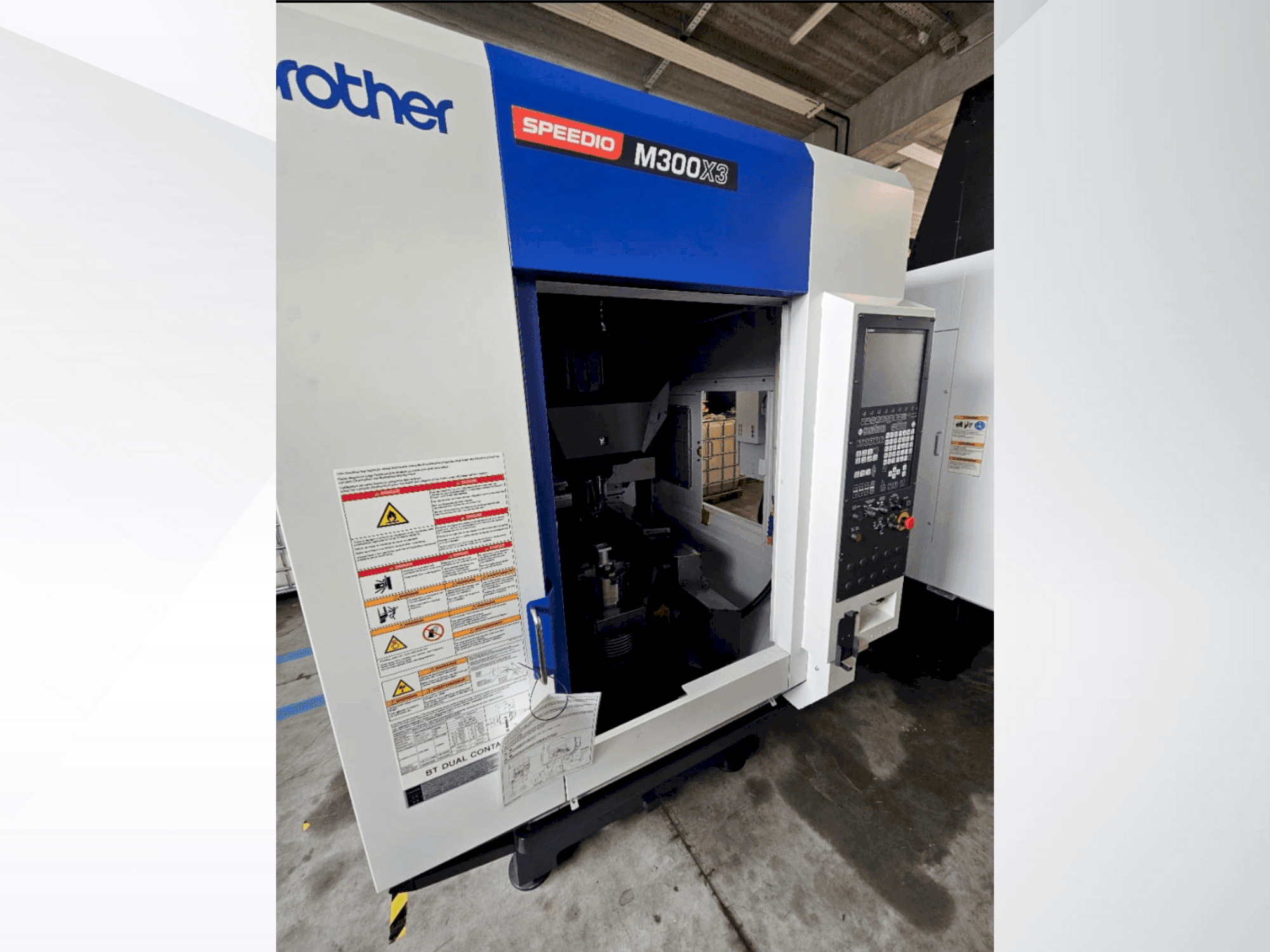 Вид станка Brother Speedio M 300 X3 спереди