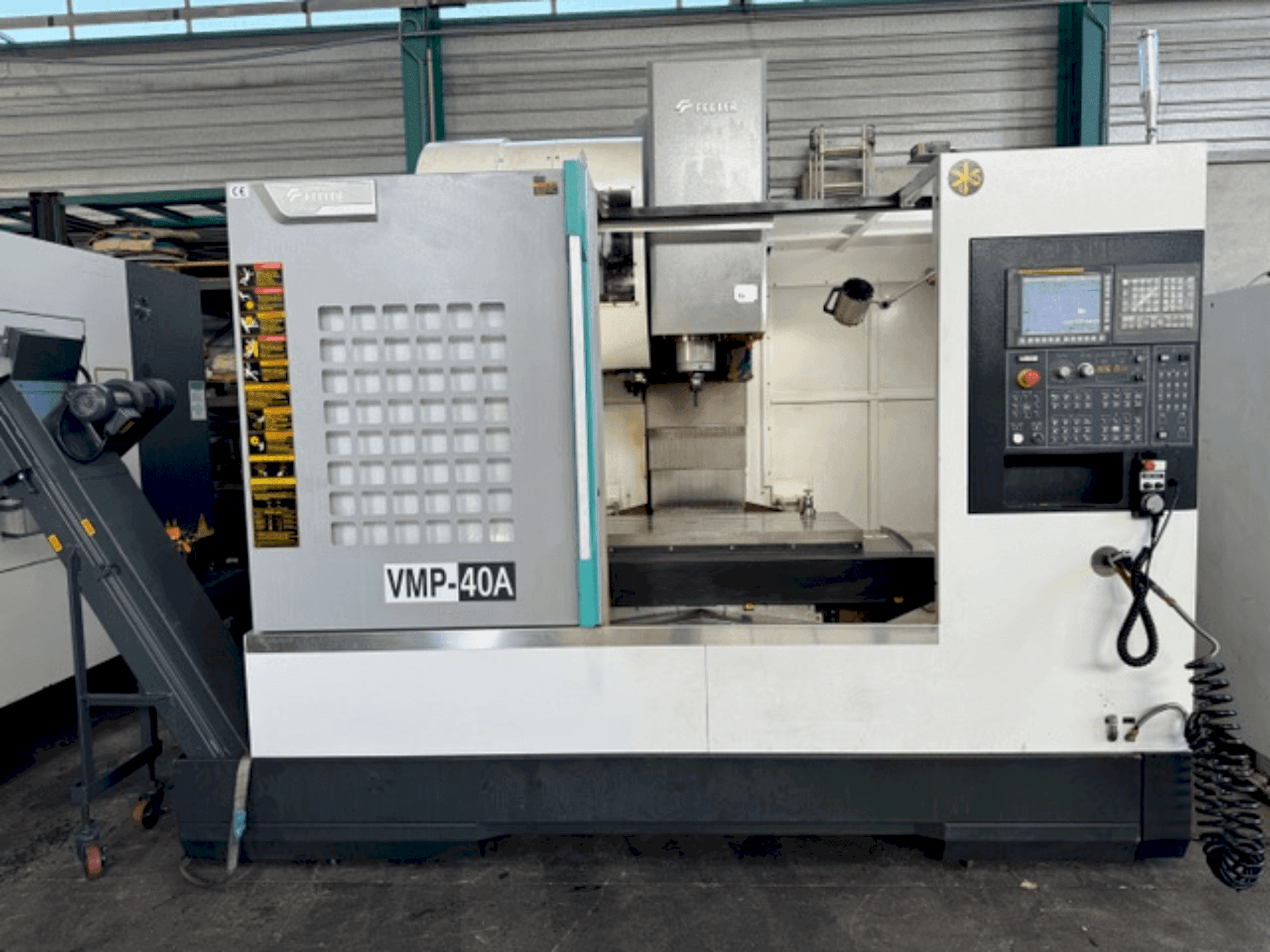 Вид станка Feeler VMP40A спереди