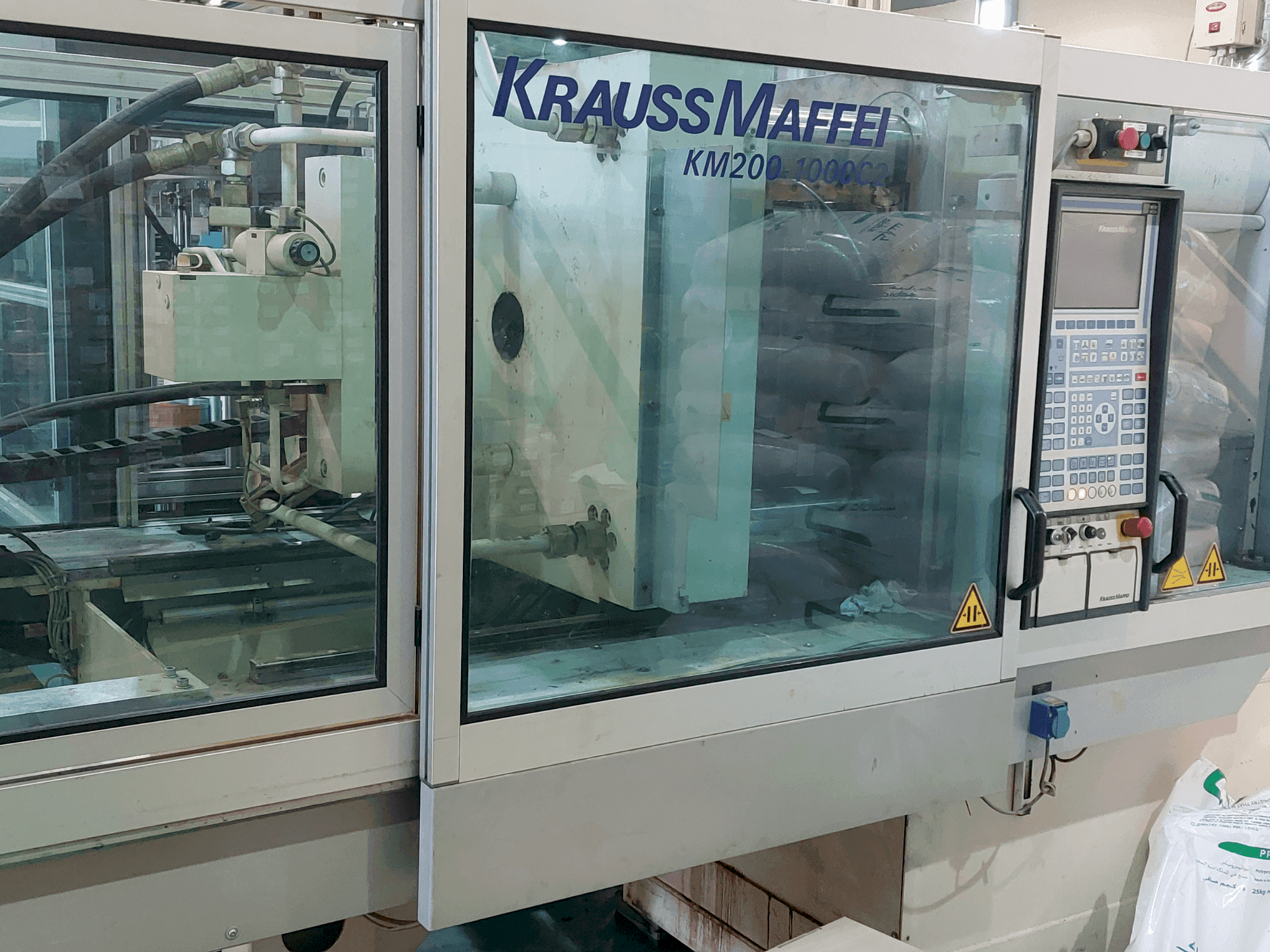 Вид станка Krauss Maffei 200-1000 C2 спереди