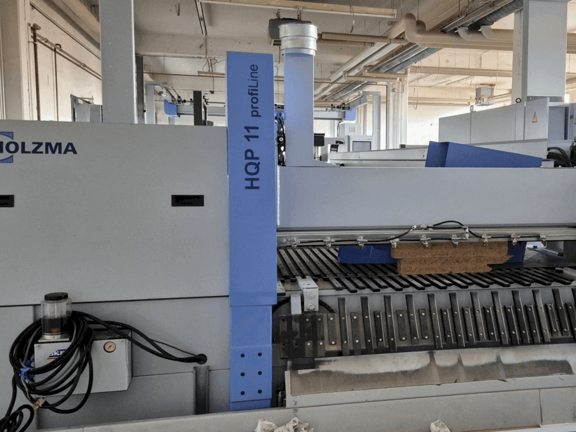 Вид станка HOLZMA PROFI HQP 11/16/56/L/X спереди