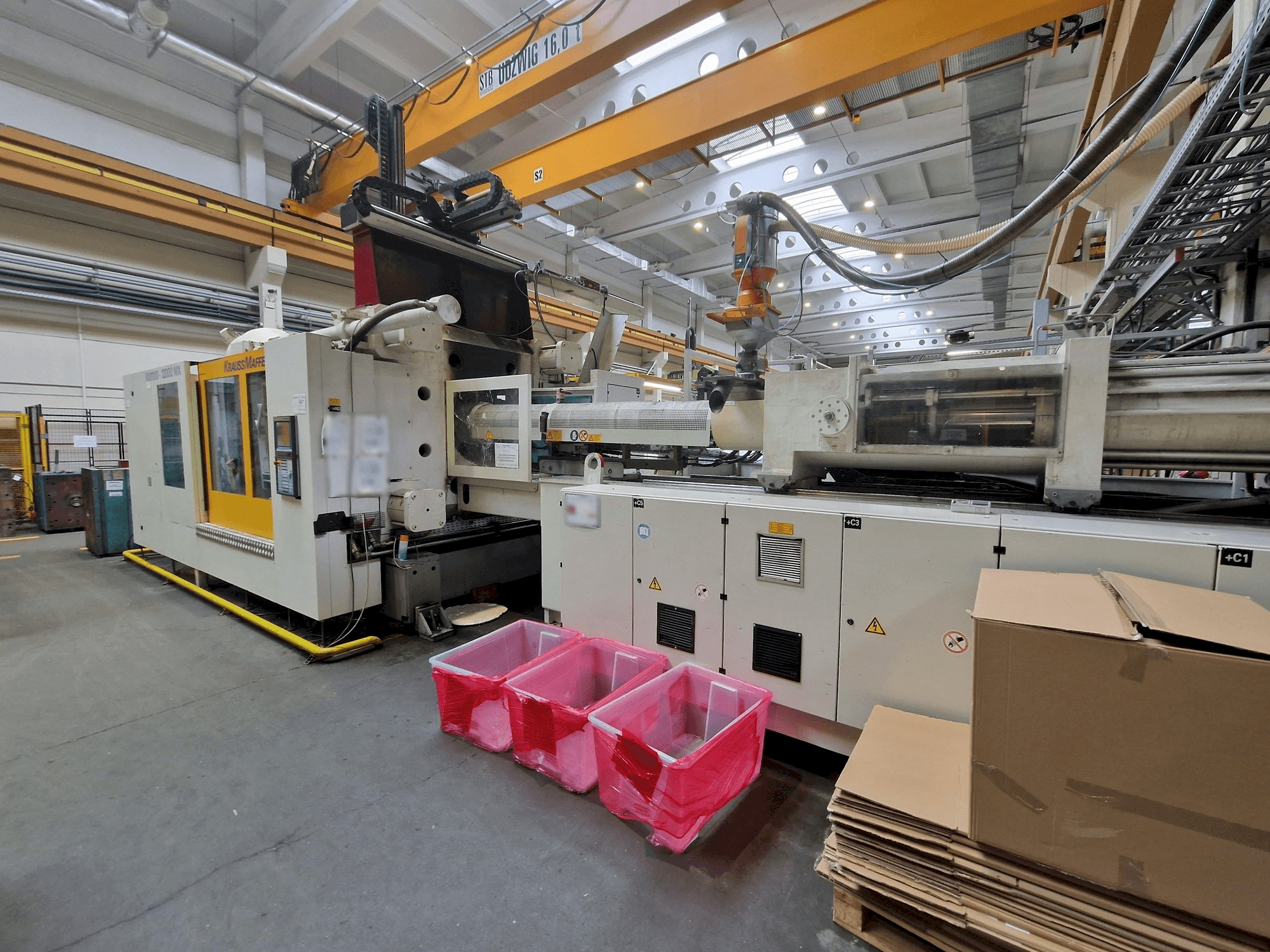 Вид станка Krauss Maffei 1100-12000 MX спереди