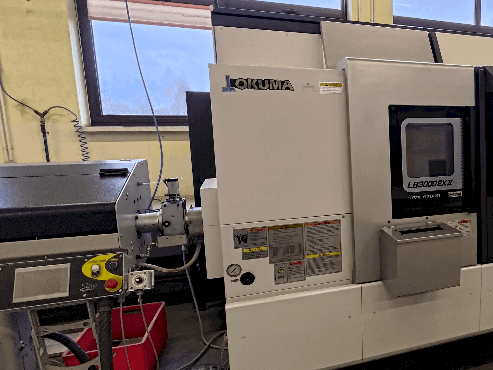 Вид станка Okuma LB 3000 EXII MYW 450 спереди