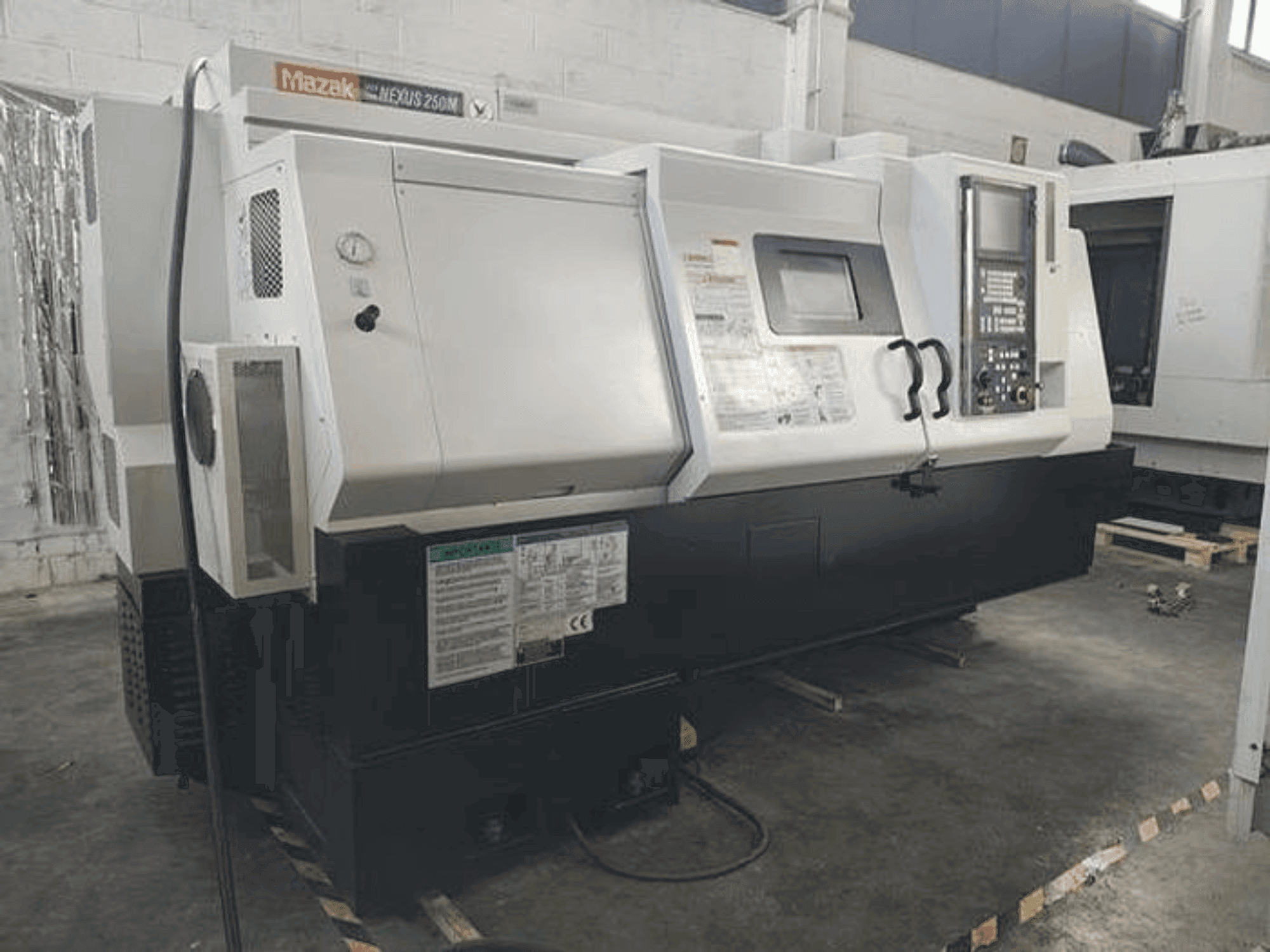 Вид станка Mazak QTN 250M 1000L спереди