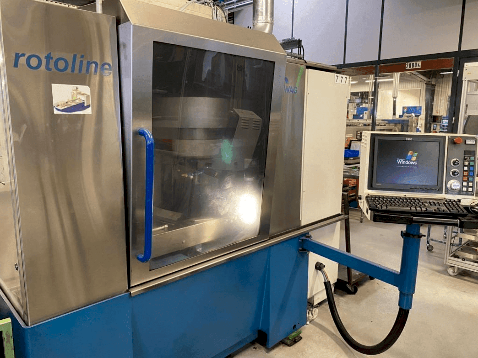 Вид станка EWAG ROTOLINE 6X спереди