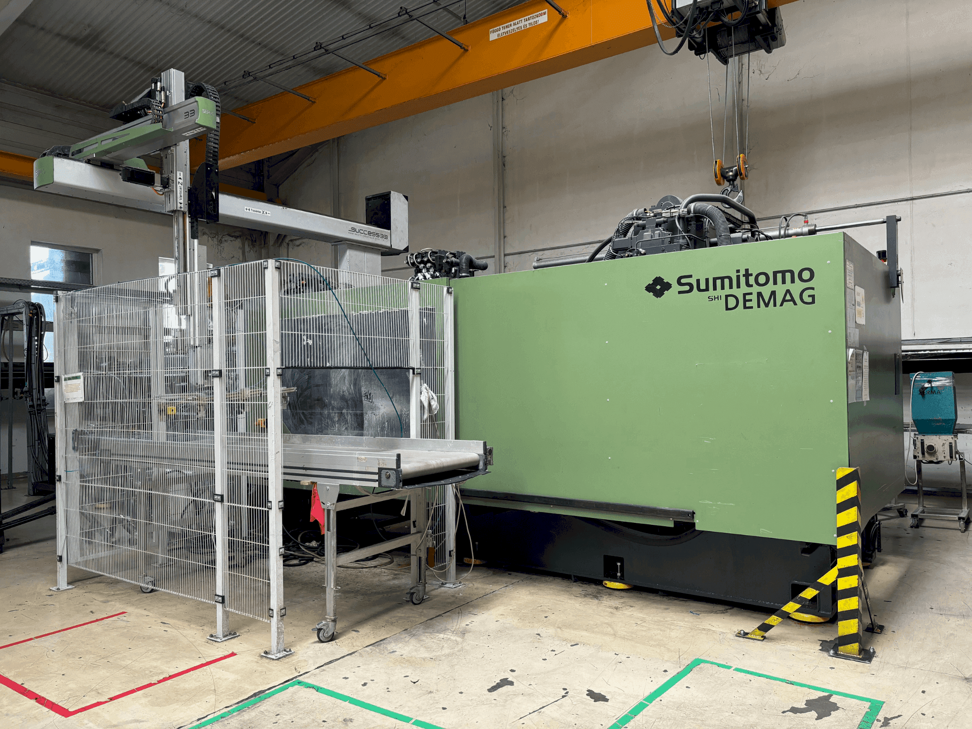 Вид станка SUMITOMO SHI DEMAG Systec 800/1120-6400 спереди